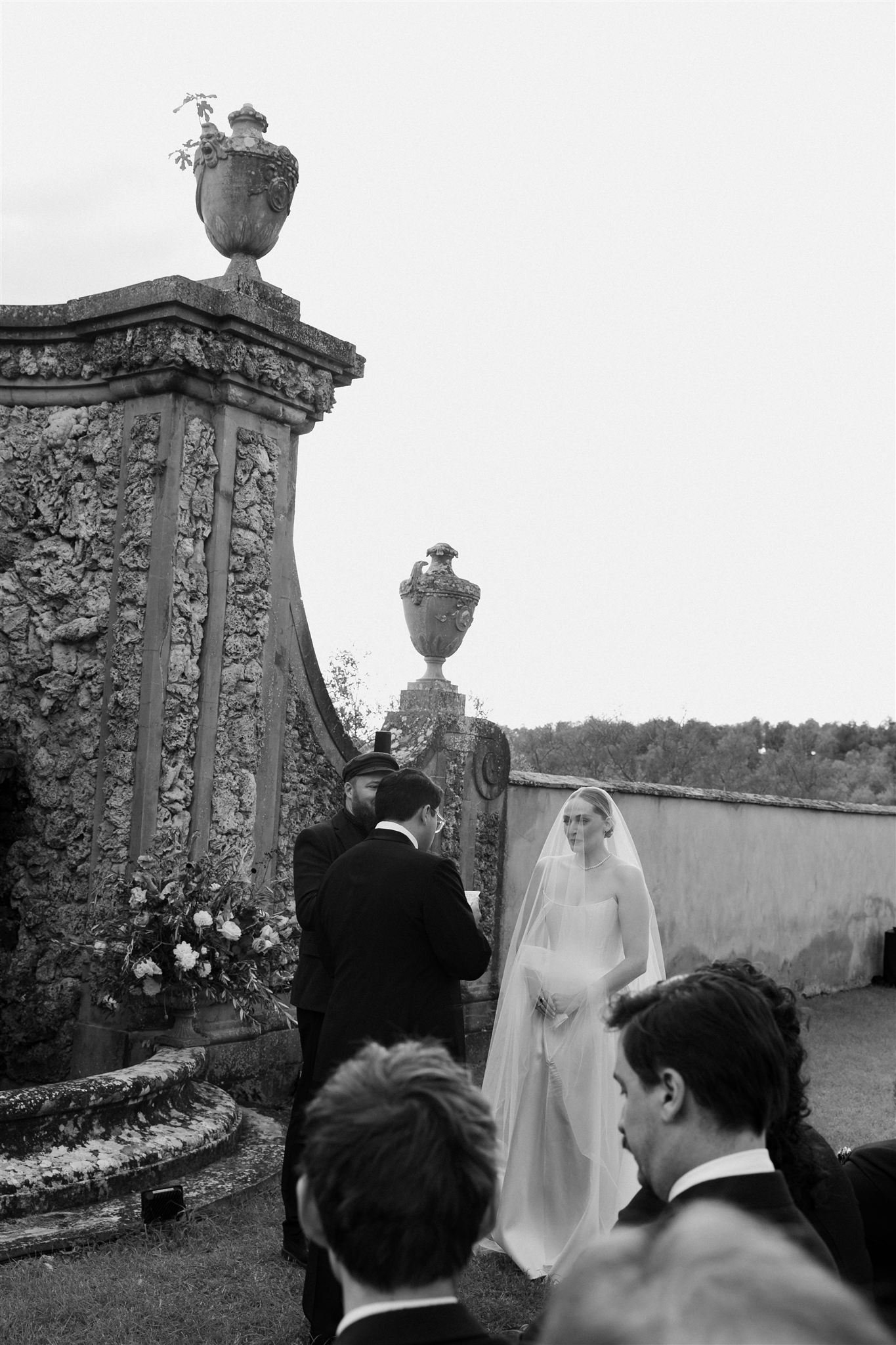 Garden Wedding Ceremony on a wedding day at Villa Medicea Di Lilliano in Tuscany, Italy.