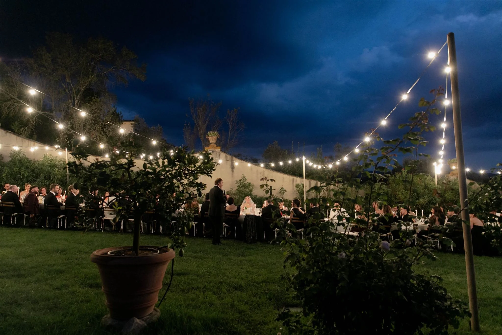 Garden wedding reception on a wedding day at Villa Medicea Di Lilliano in Tuscany, Italy.