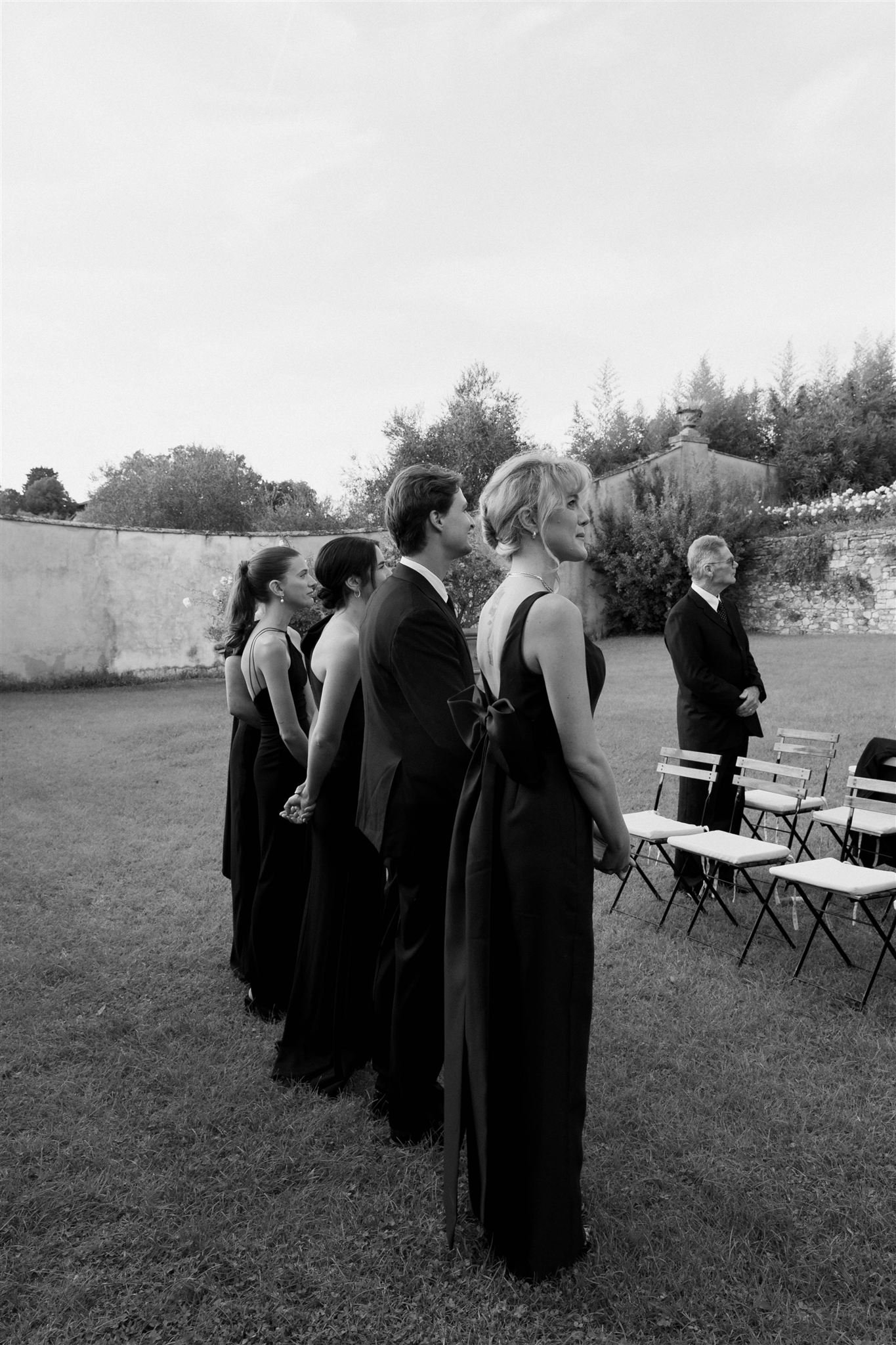 Garden Wedding Ceremony on a wedding day at Villa Medicea Di Lilliano in Tuscany, Italy.