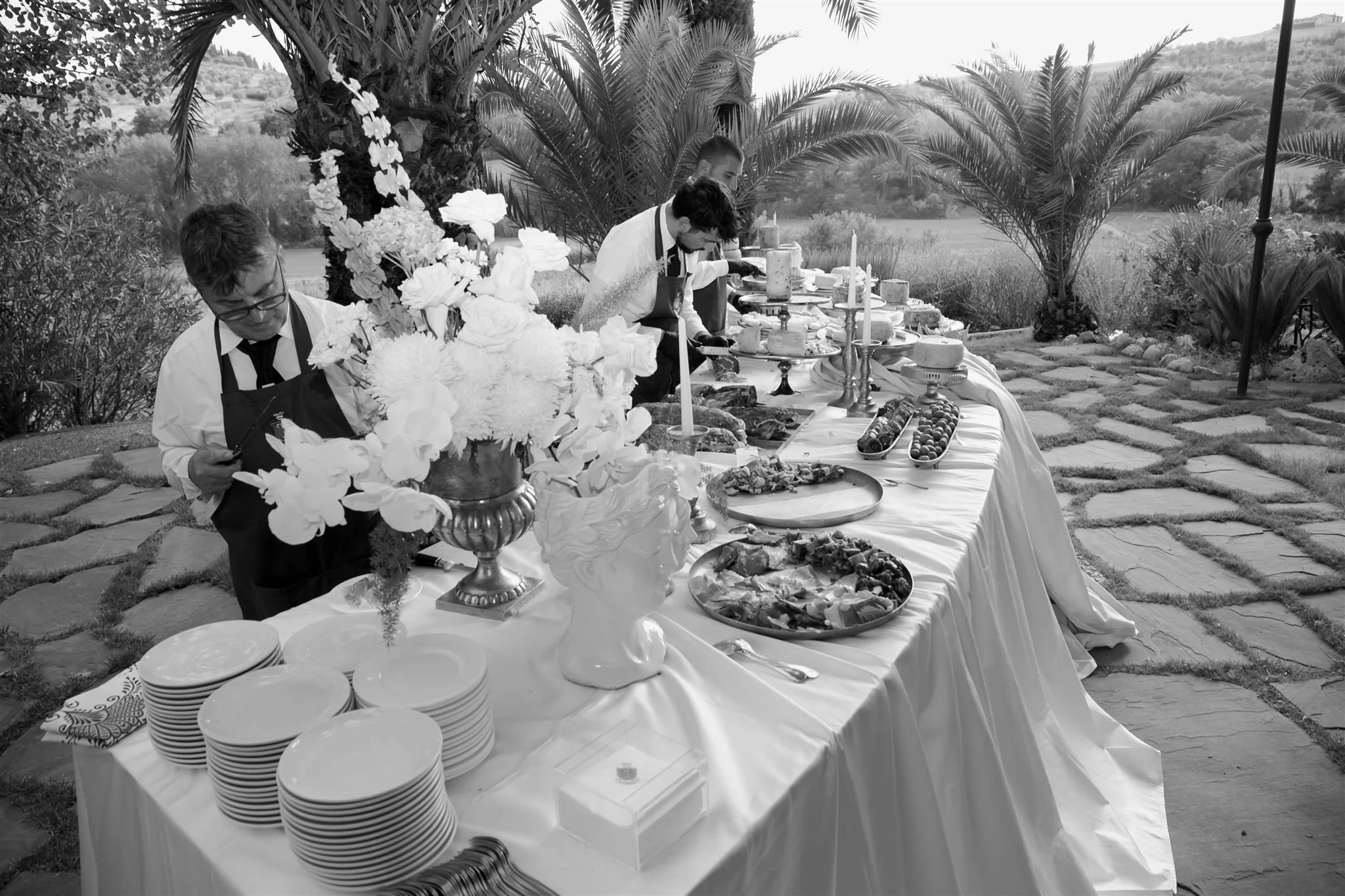 A poolside cocktail hour on a wedding day at Tenuta Corbinaia Villa in Tuscany, Italy.