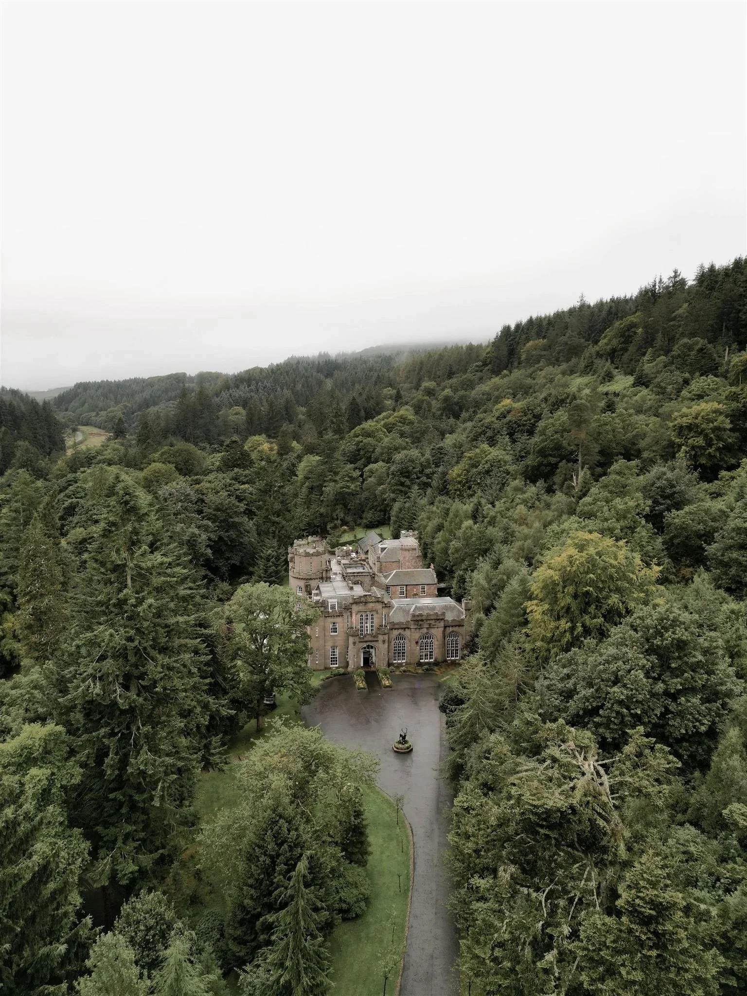 A scottish castle photo on a wedding day at Drumtochty Castle in Scotland.