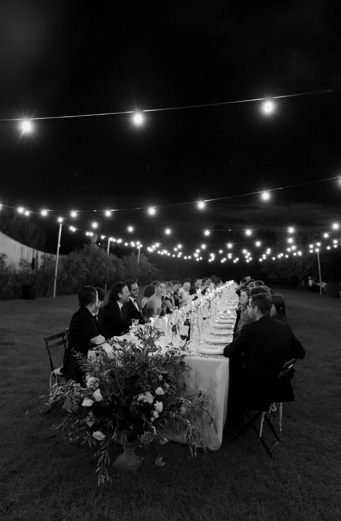 Garden wedding reception on a wedding day at Villa Medicea Di Lilliano in Tuscany, Italy.