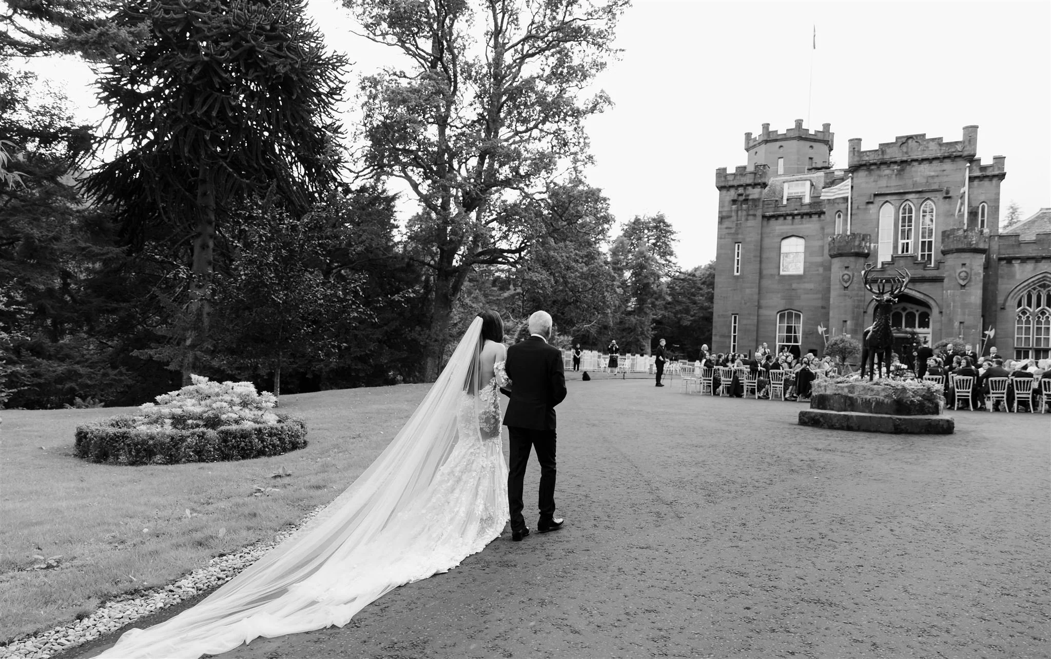 A luxury castle wedding ceremony on a wedding day at Drumtochty Castle in Scotland.