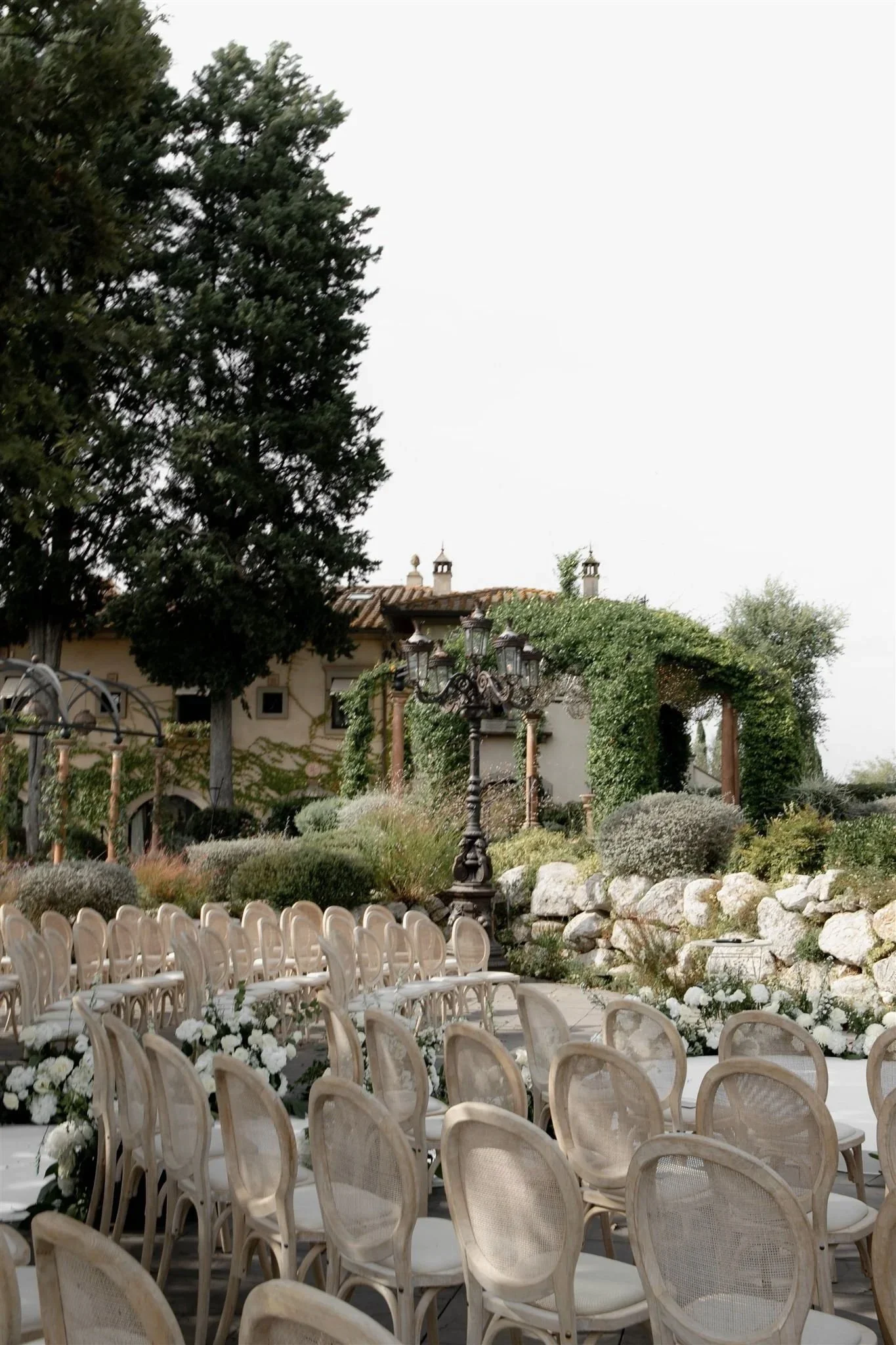 Am outdoor wedding ceremony at Tenuta Corbinaia Villa in Tuscany, Italy.