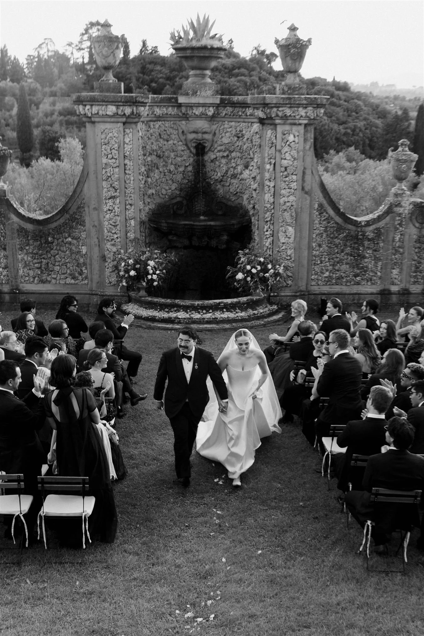 Garden Wedding Ceremony on a wedding day at Villa Medicea Di Lilliano in Tuscany, Italy.
