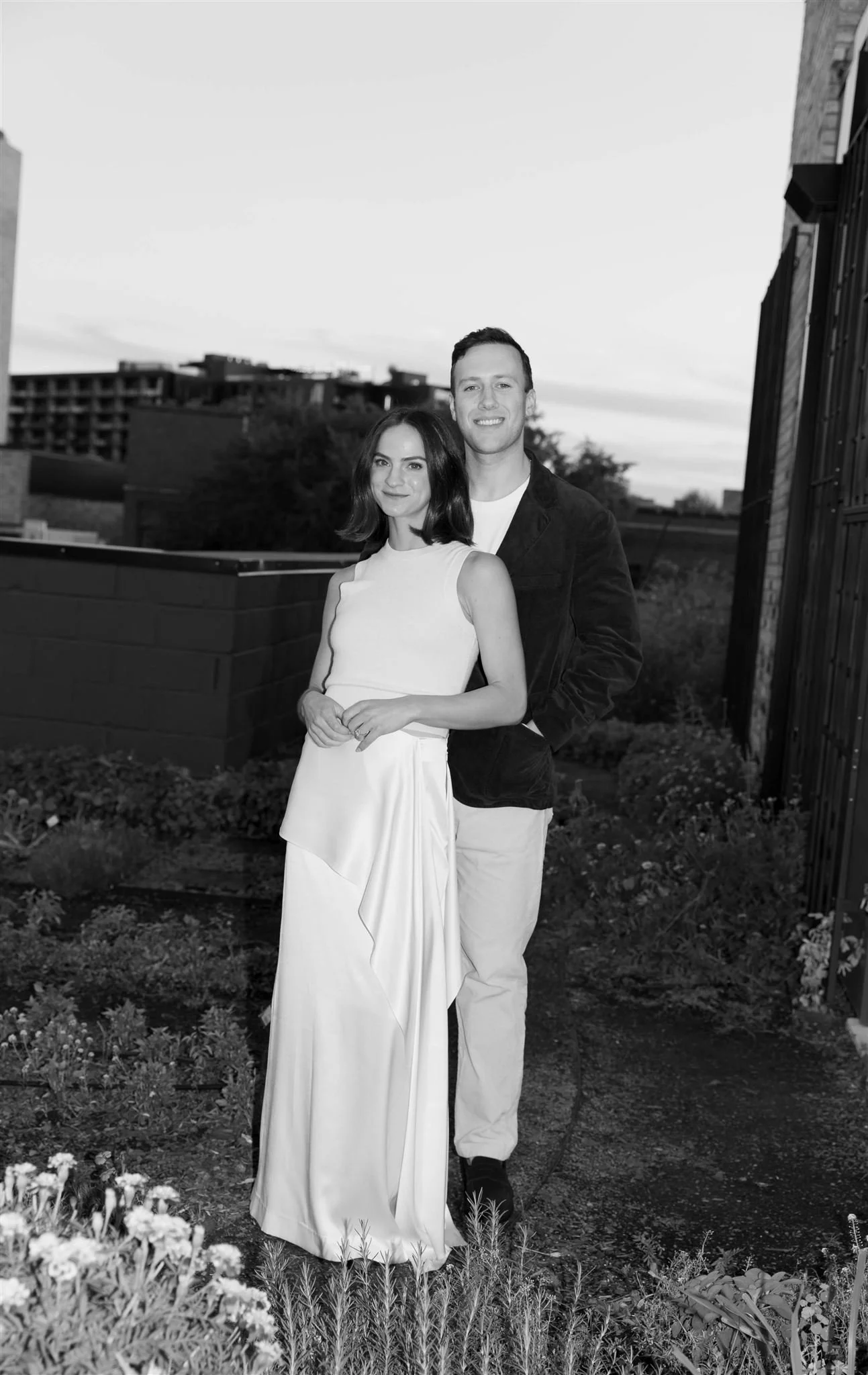 Maxwells Trading Chicago wedding rehearsal dinner with rooftop skyline portraits in downtown Chicago.