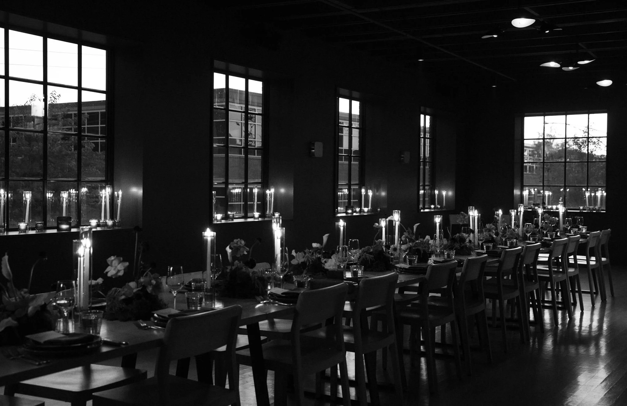 Intimate candlelit rehearsal dinner at Maxwells Trading Chicago wedding venue.