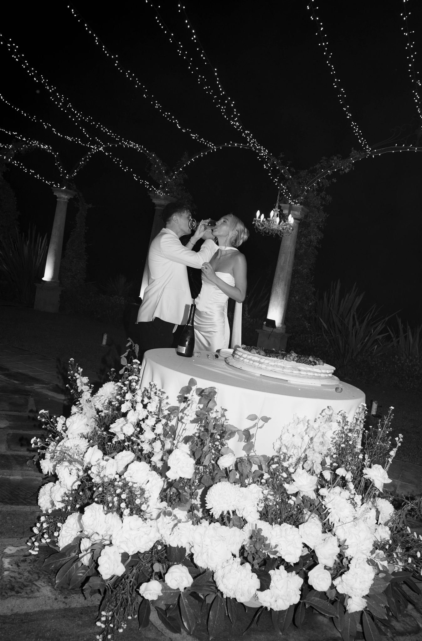 An italian cake cutting on a wedding day at Tenuta Corbinaia Villa in Tuscany, Italy.