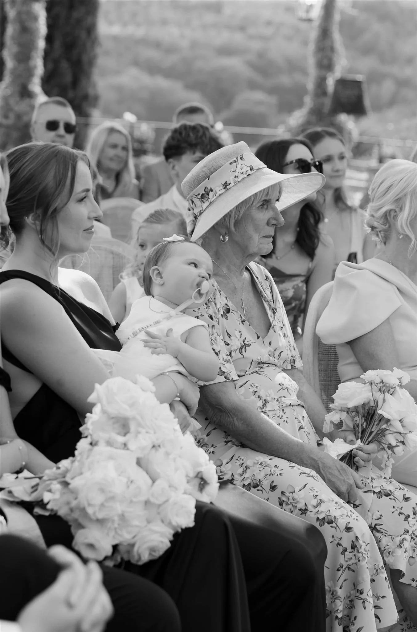 An outdoor wedding ceremony at Tenuta Corbinaia Villa in Tuscany, Italy.