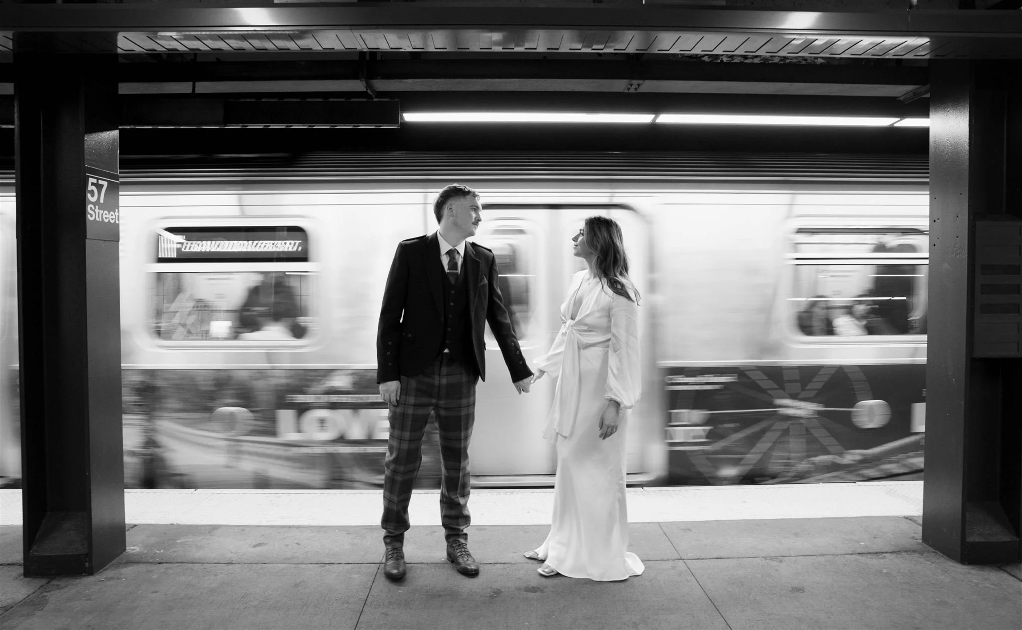 A NYC Elopement on a subway, photographed by a NYC Elopement Photographer.