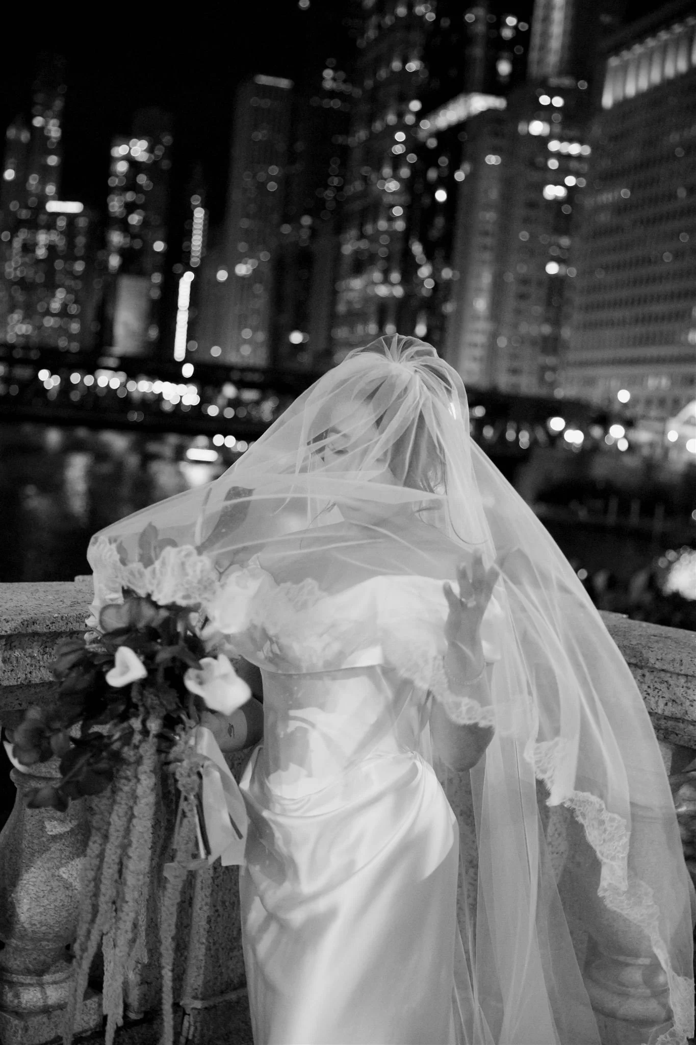 Wedding Photo of bride in downtown Chicago on the way to Gilt Bar.
