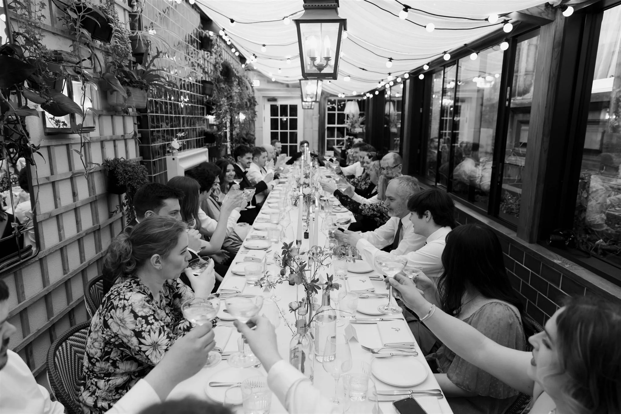 Bride and groom enjoying their wedding reception dinner at Gleneagles Townhouse after their City Chambers wedding.