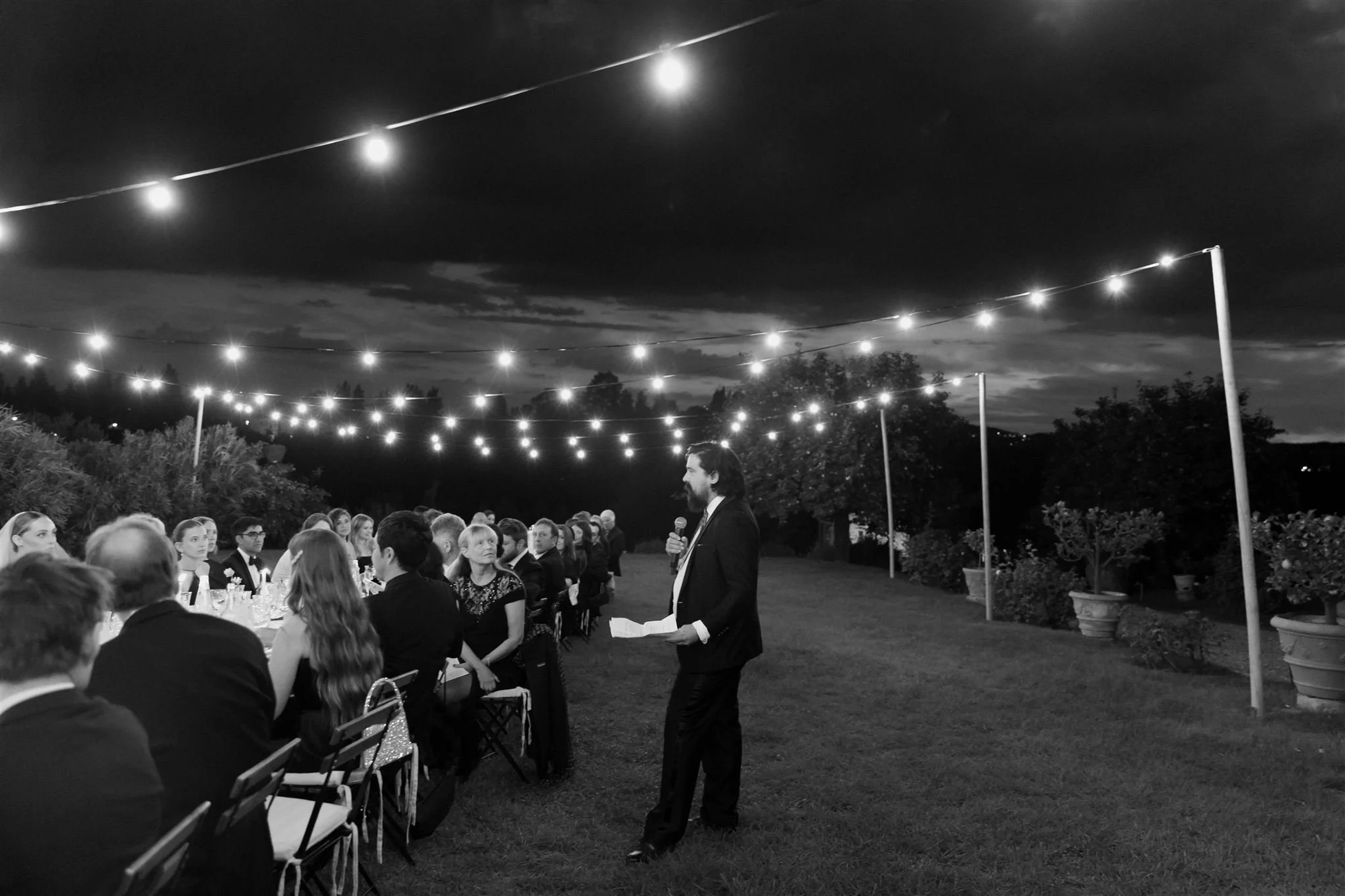 Garden wedding reception on a wedding day at Villa Medicea Di Lilliano in Tuscany, Italy.