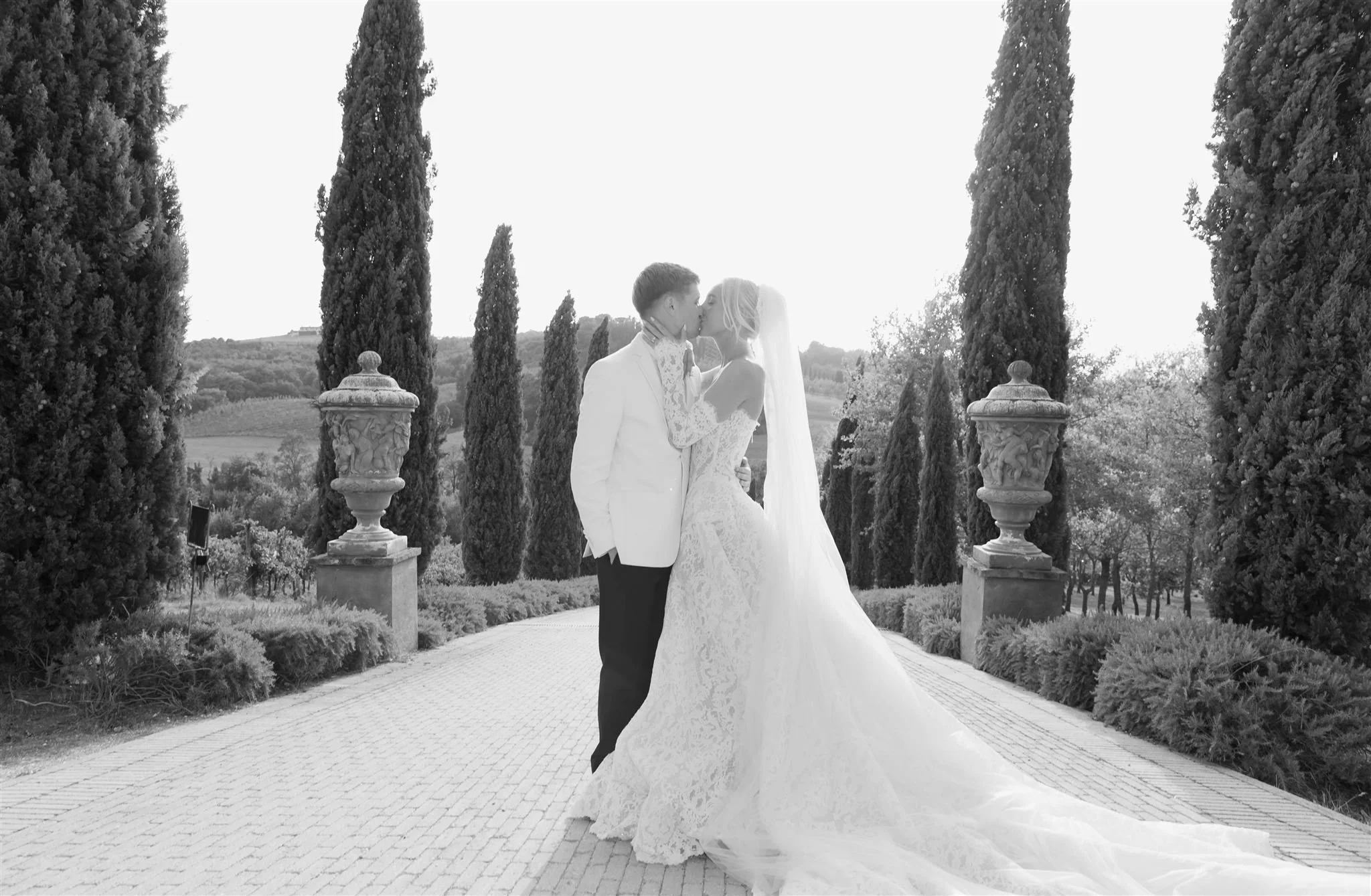 A bride and groom on a wedding day at Tenuta Corbinaia Villa in Tuscany, Italy.