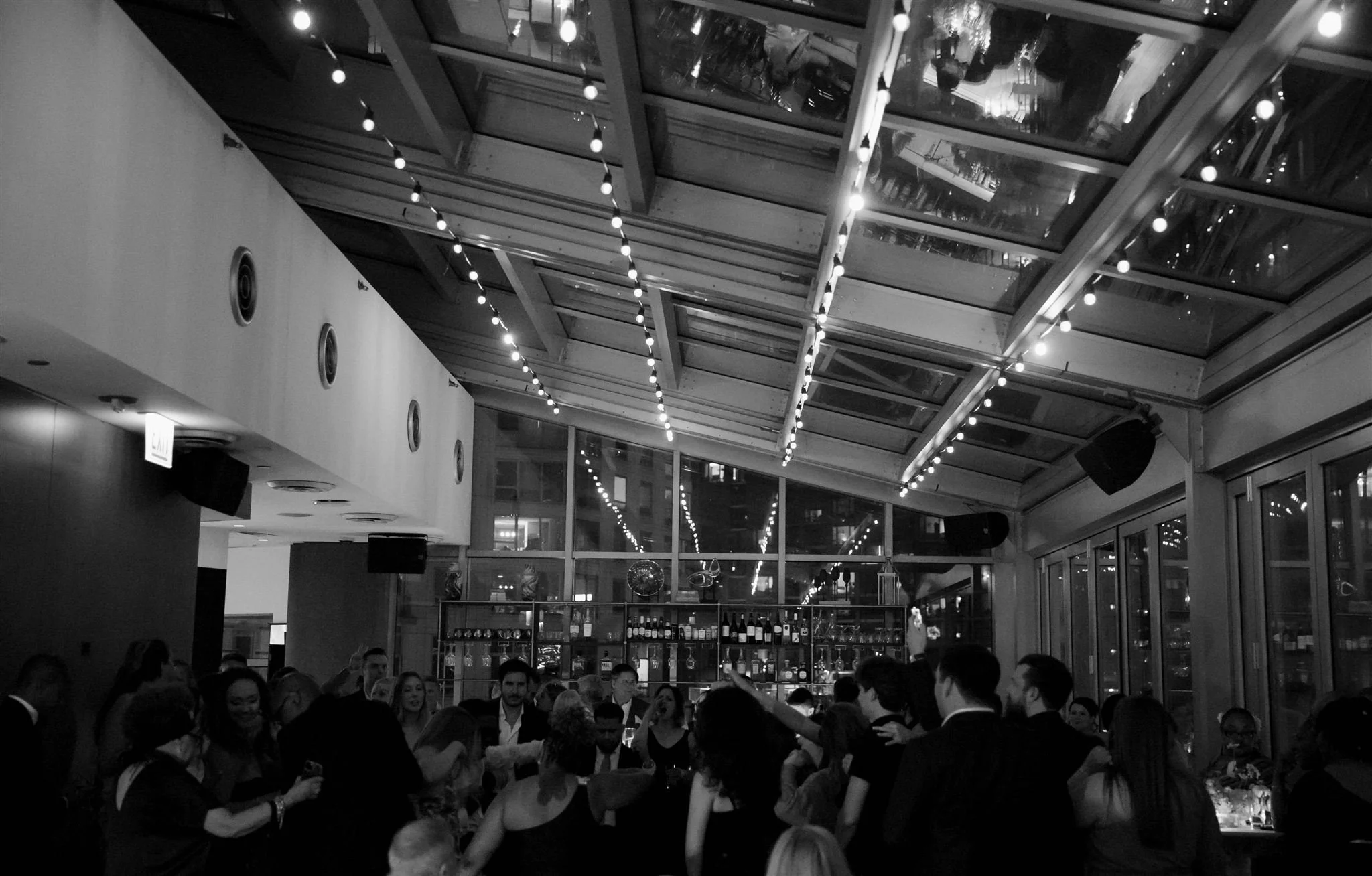 A rooftop wedding reception at Gibson’s Italia overlooking downtown Chicago.