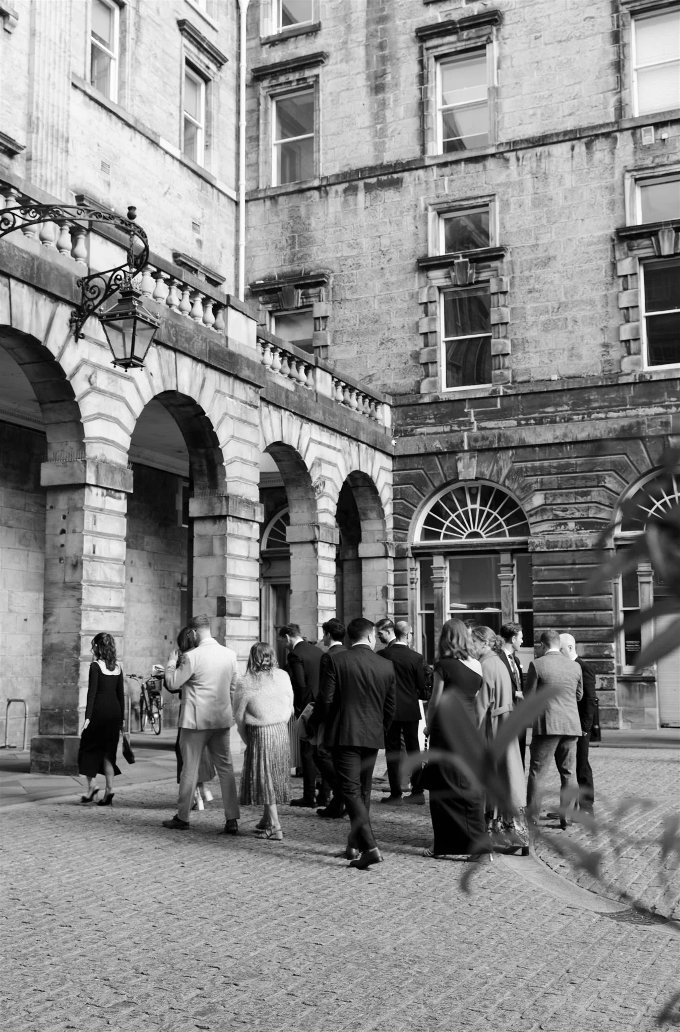 Wedding guests outside Edinburgh City Chambers on their wedding day in Edinburgh, Scotland.
