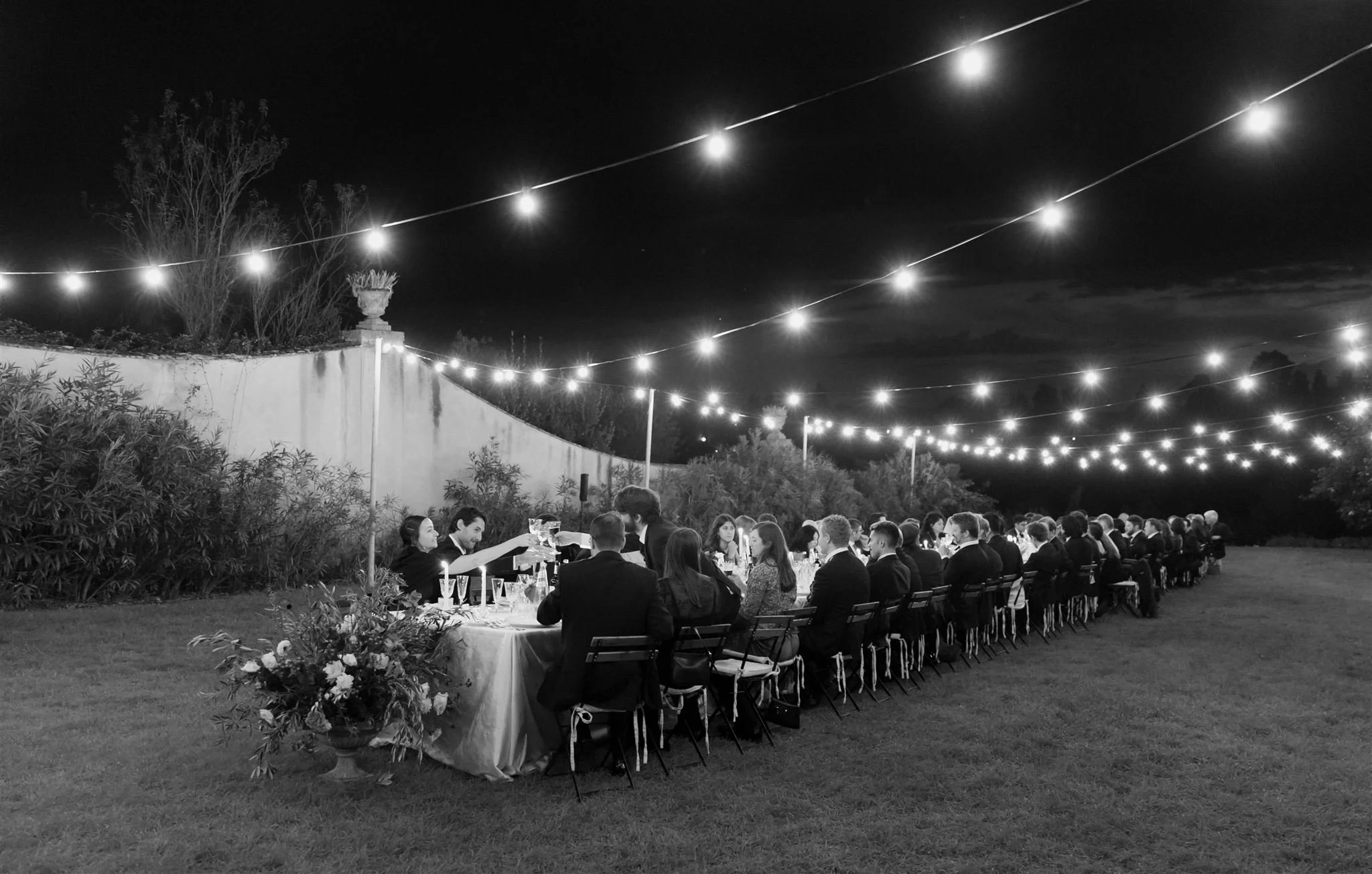 Garden wedding reception on a wedding day at Villa Medicea Di Lilliano in Tuscany, Italy.