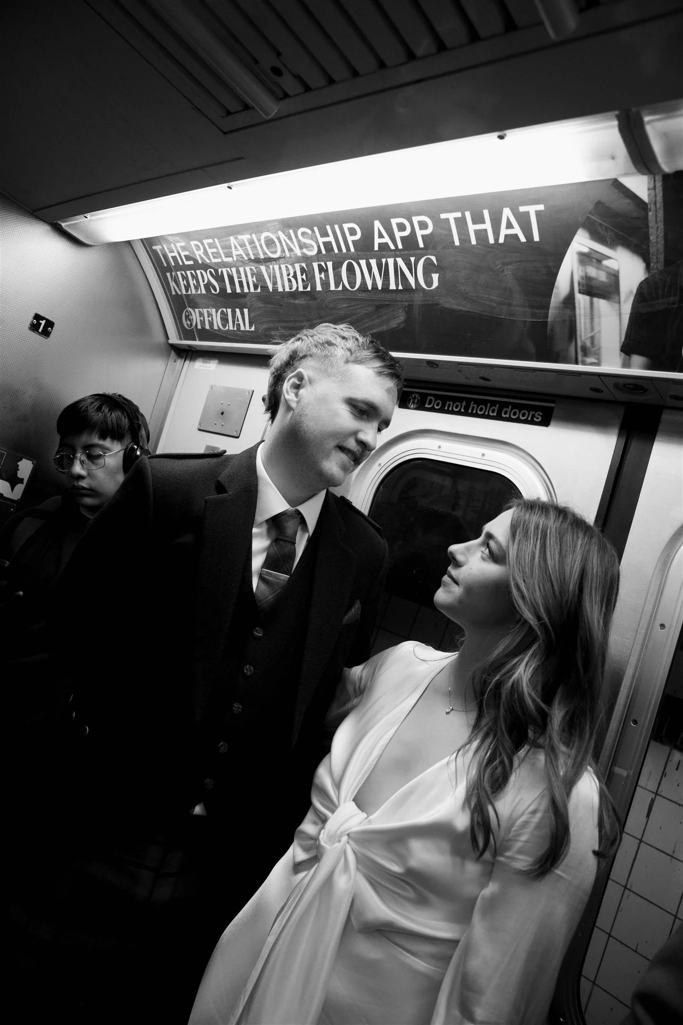A NYC Elopement on a subway, photographed by a NYC Elopement Photographer.