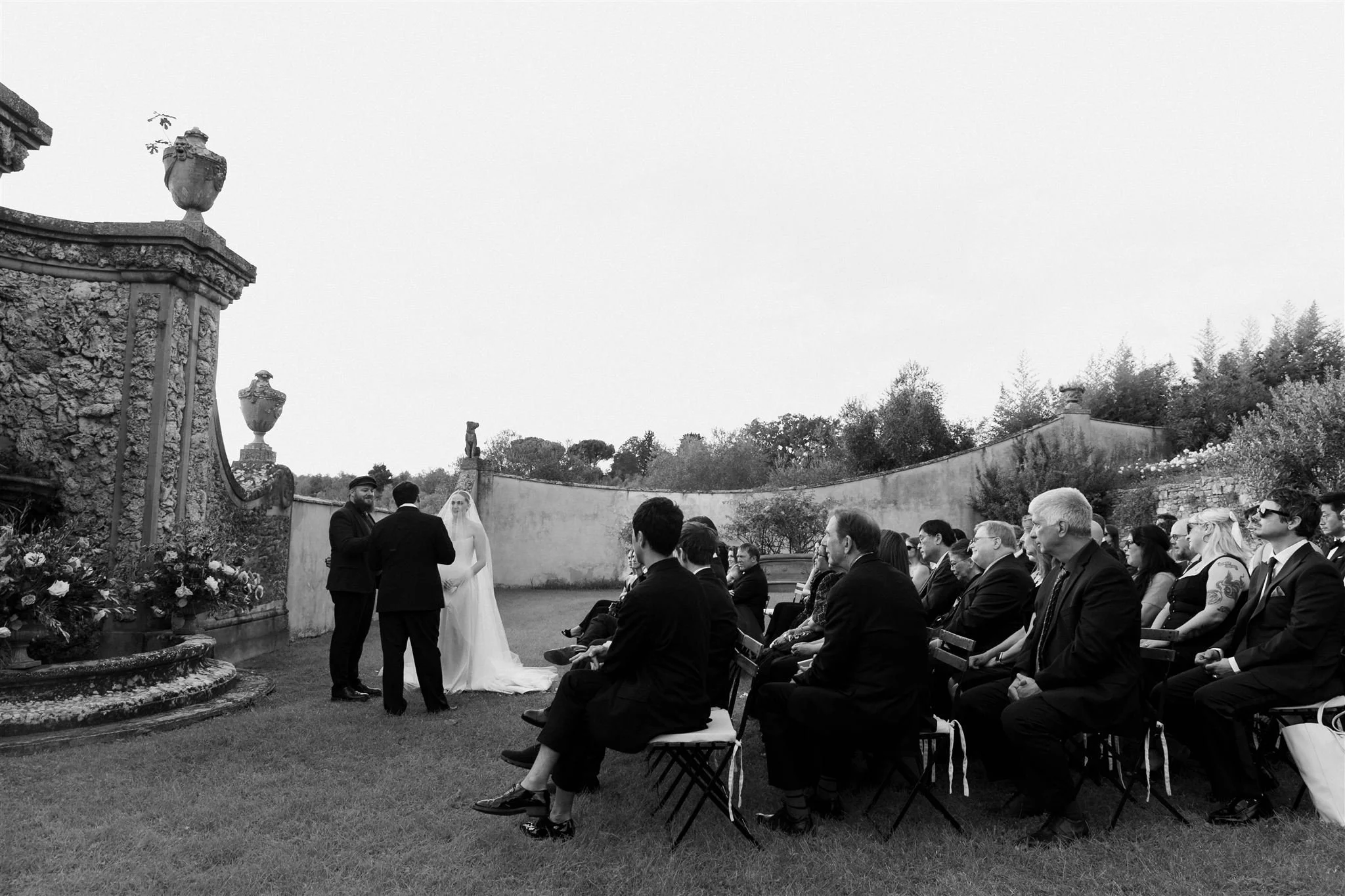Garden Wedding Ceremony on a wedding day at Villa Medicea Di Lilliano in Tuscany, Italy.