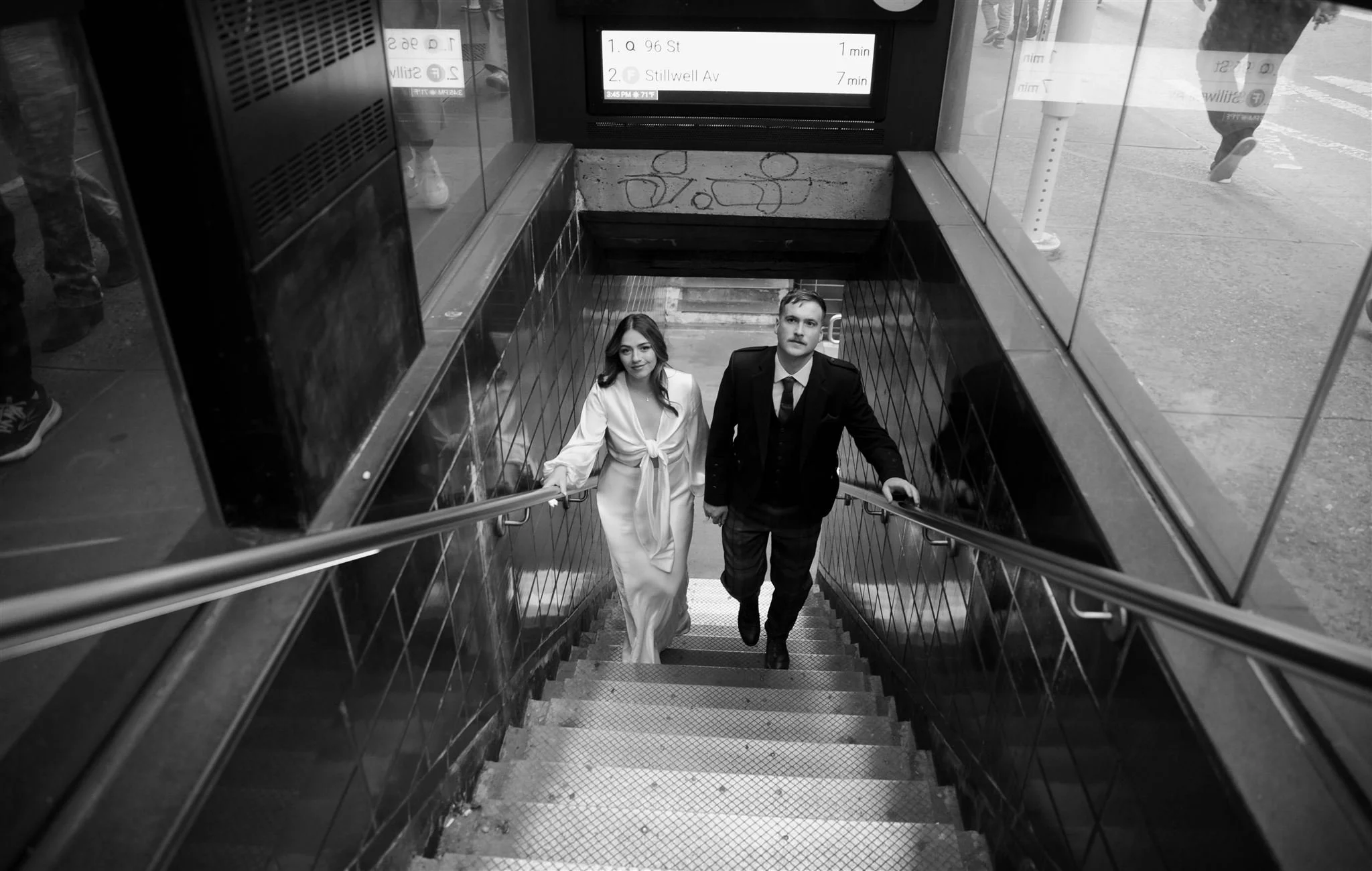 A NYC Elopement on a subway, photographed by a NYC Elopement Photographer.