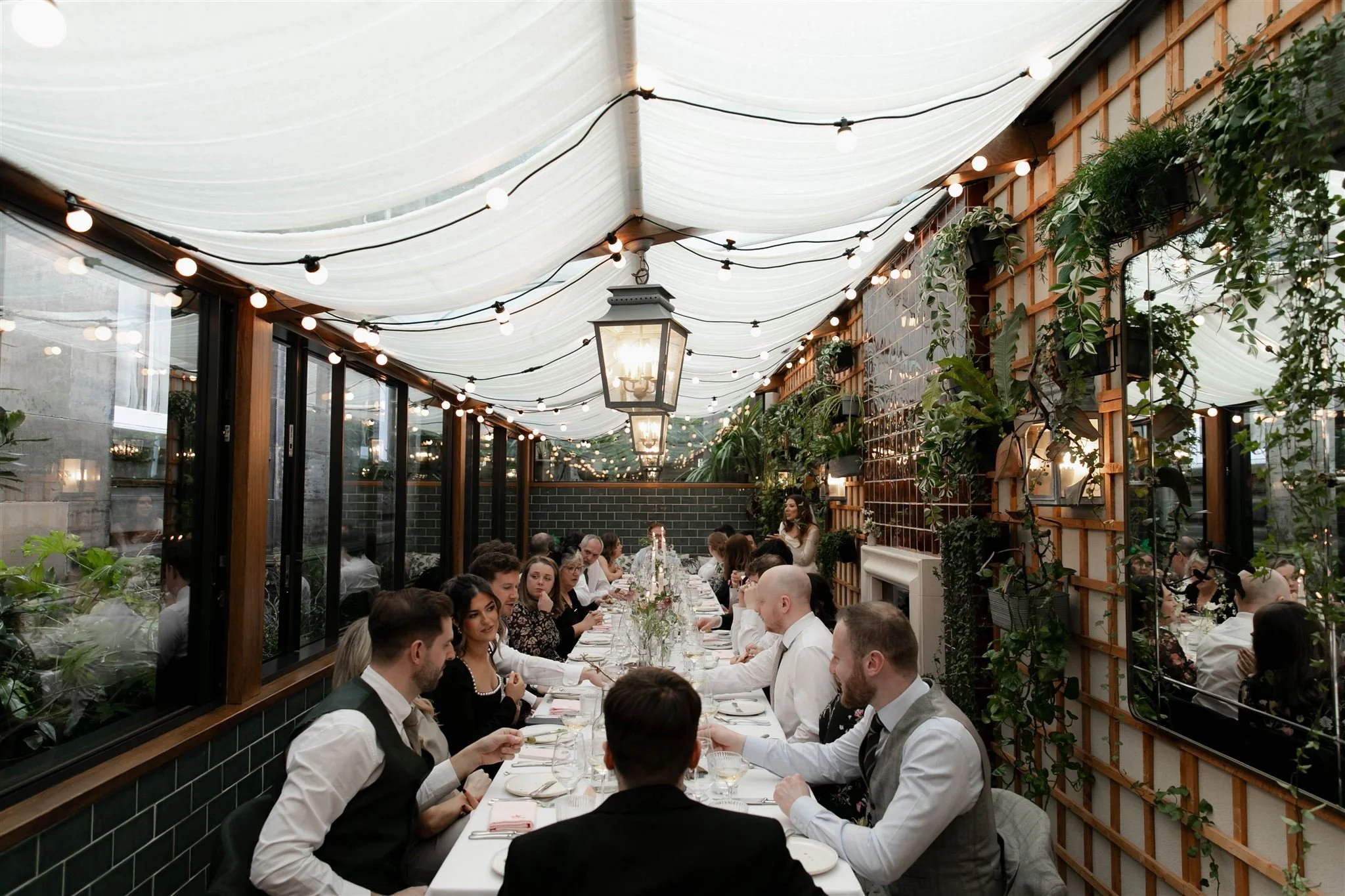 Guests gathered for a wedding reception dinner at Gleneagles Townhouse.