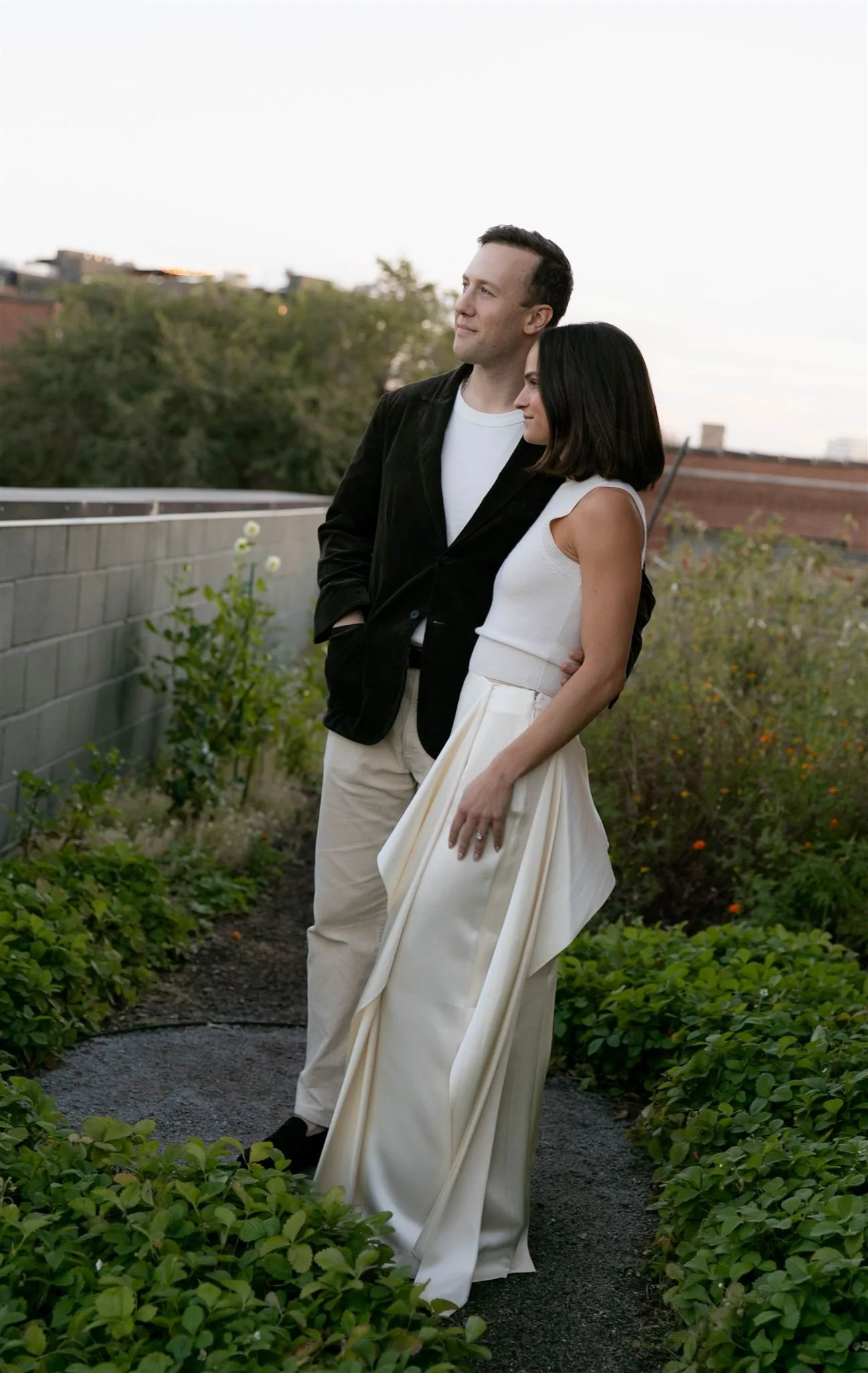 Maxwells Trading Chicago wedding rehearsal dinner with rooftop skyline portraits in downtown Chicago.