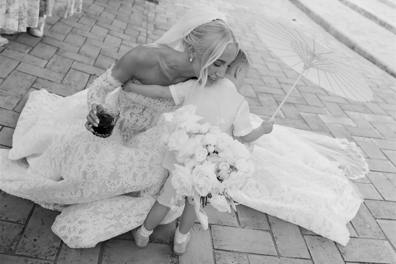A poolside cocktail hour on a wedding day at Tenuta Corbinaia Villa in Tuscany, Italy.