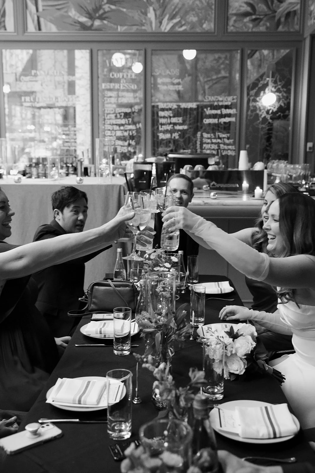 A wedding cheers at Venteux Chicago inside the Pendry Hotel.