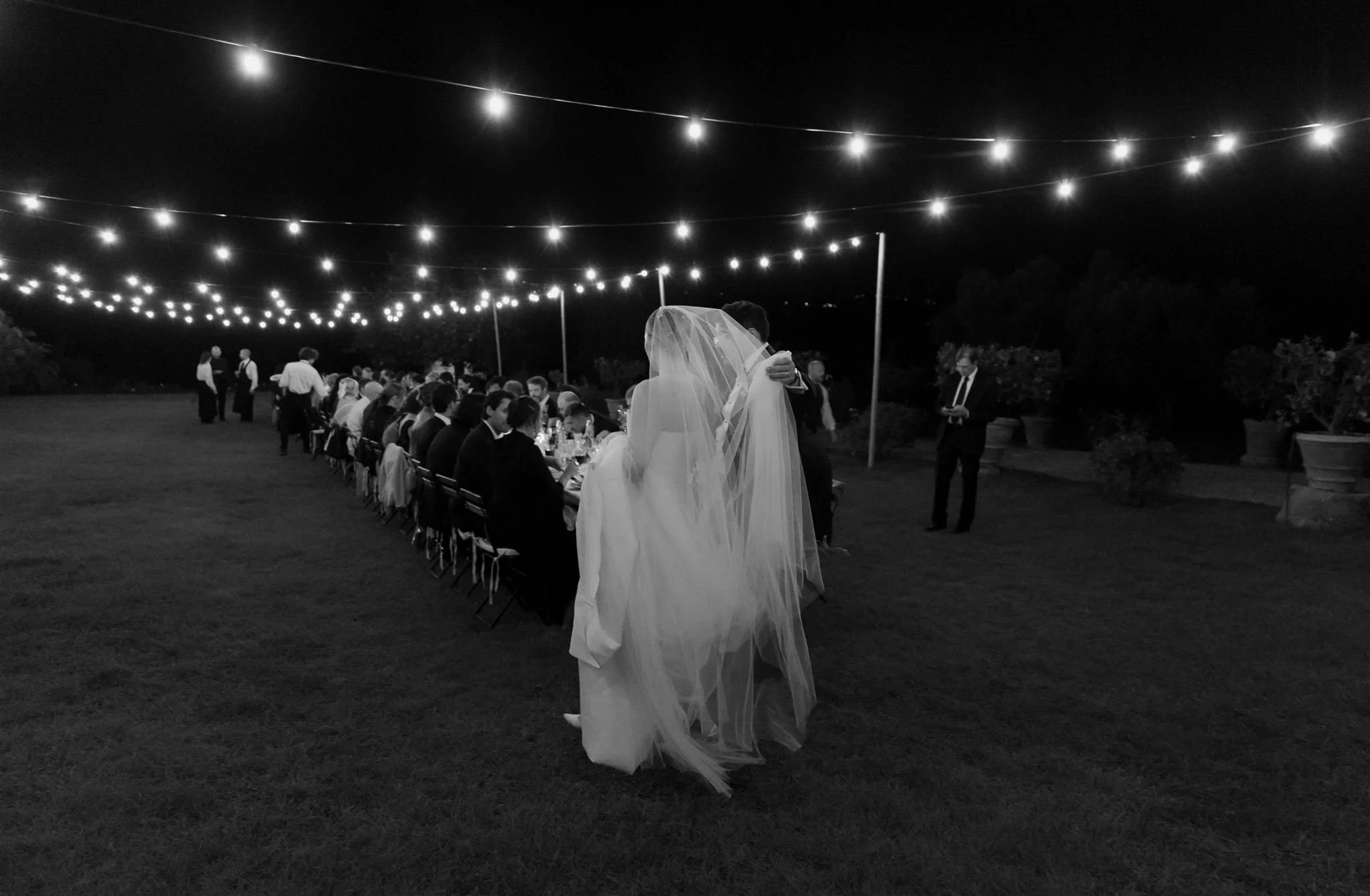 Garden wedding reception on a wedding day at Villa Medicea Di Lilliano in Tuscany, Italy.