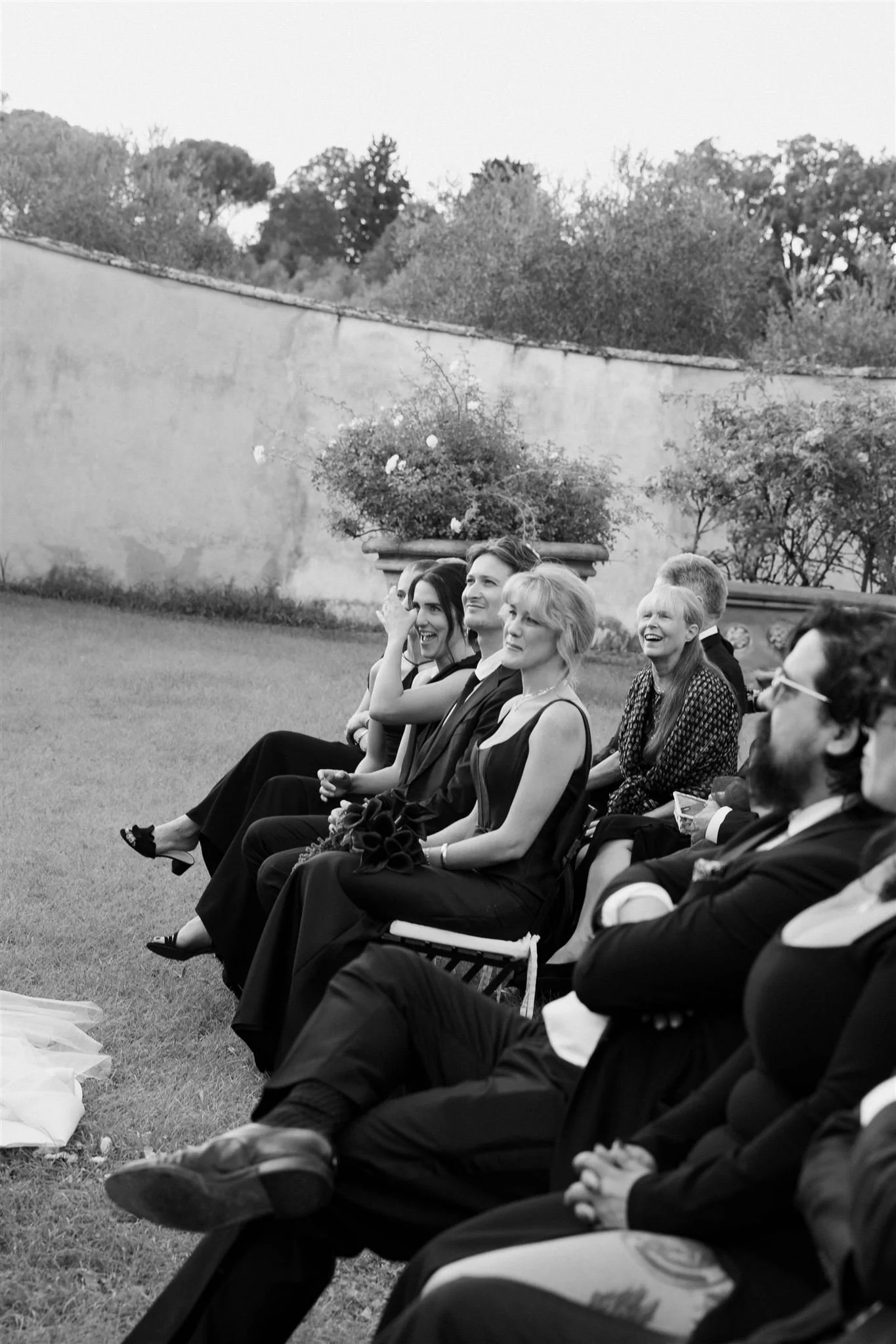 Garden Wedding Ceremony on a wedding day at Villa Medicea Di Lilliano in Tuscany, Italy.