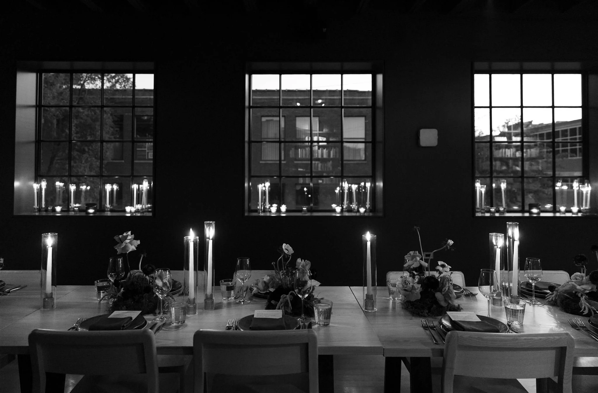 Intimate candlelit rehearsal dinner at Maxwells Trading Chicago wedding venue.