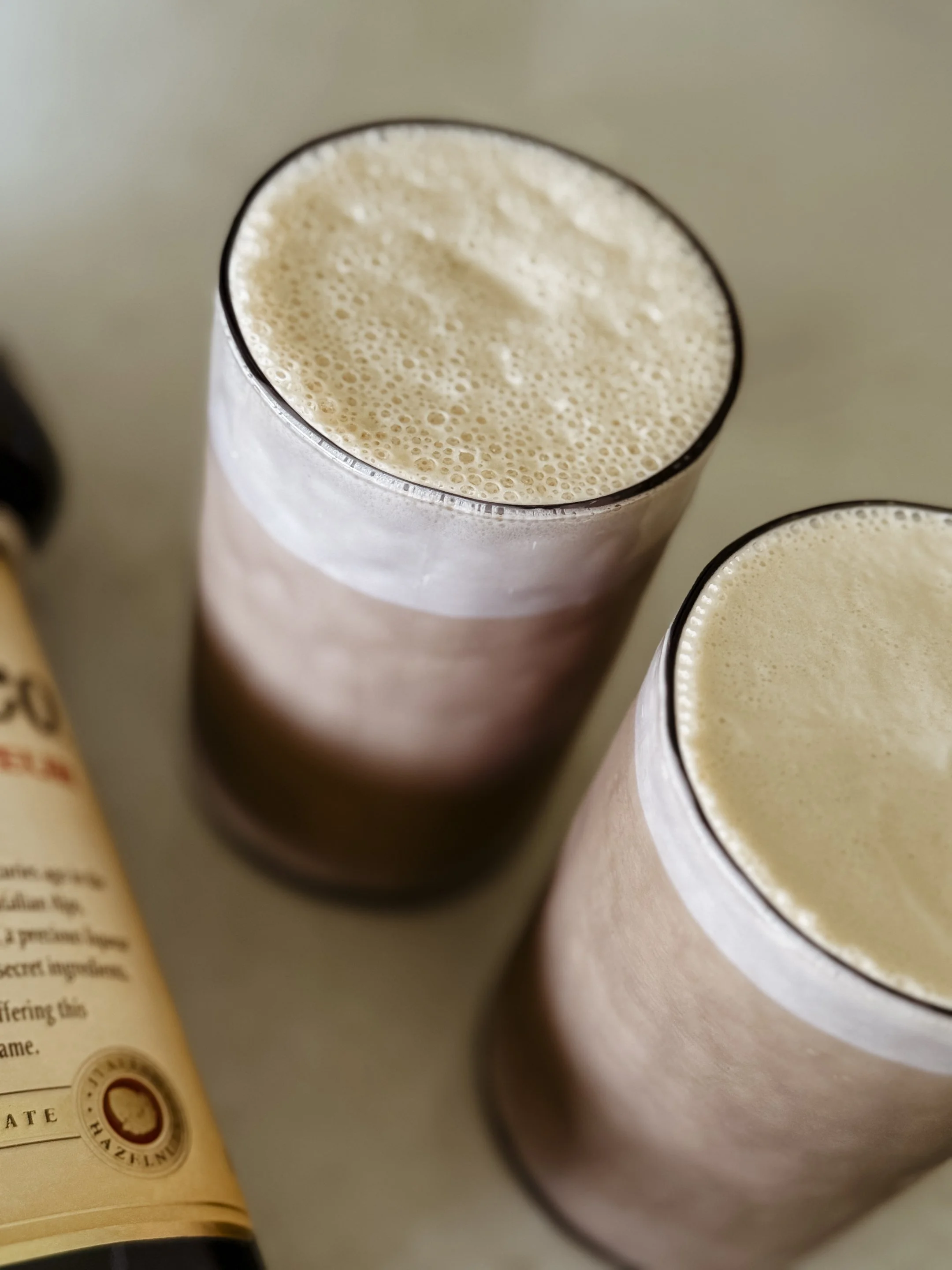 Studio protein iced coffee on a warm summer day in Australia, enjoyed during a timber renovation project.