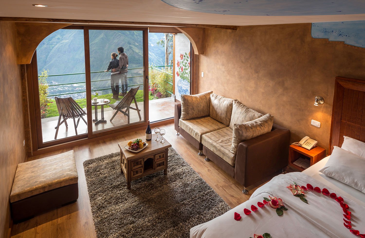 Couple on Terrace Romantic Room Amor Celestial 33 - Luna Volcan - Hotel en Banos Ecuador.jpg