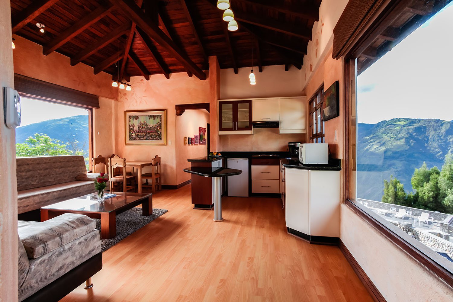 Kitchen and Living Room Suite Huayna Capac 47 - Luna Volcan - Hotel en Banos Ecuador.jpg