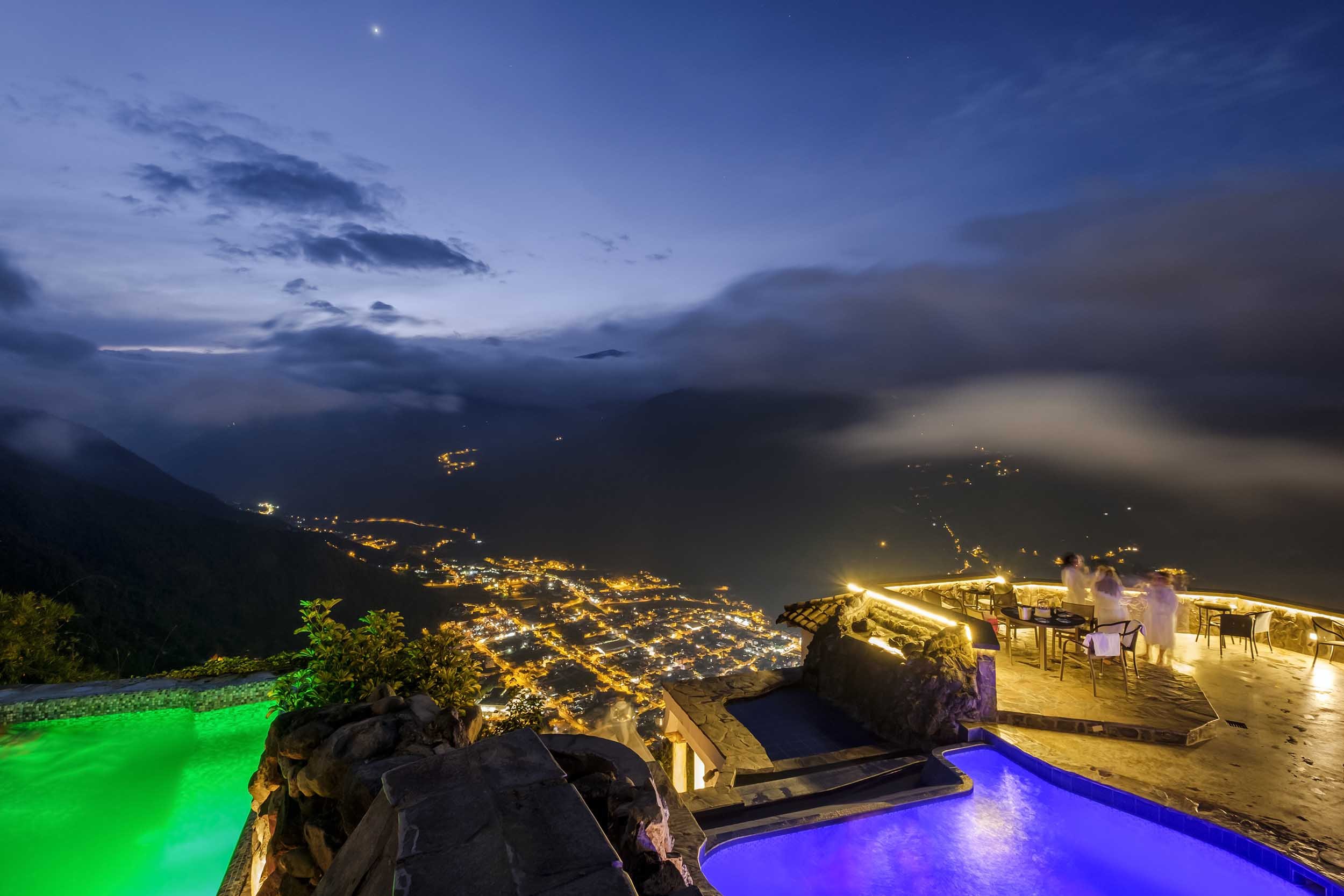 Pools and view of Banos - Luna Volcan - Hotel in Banos Ecuador.jpg