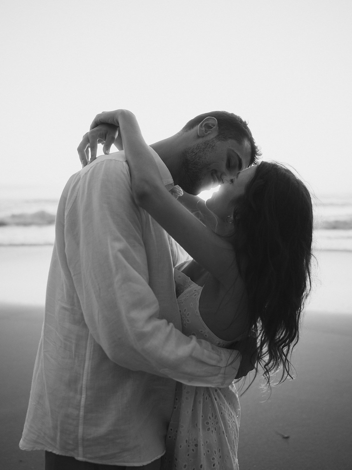 Black and White Engagement Photo. Praia da Adraga, Portugal.