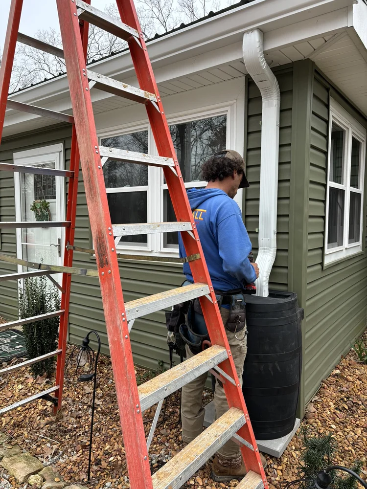 Rain barrel water collection system installed by Servall