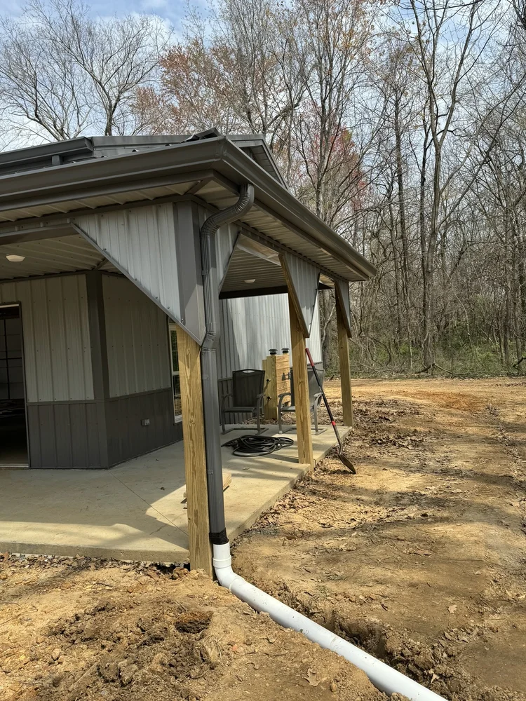 Barndominium underground drain installation by Servall