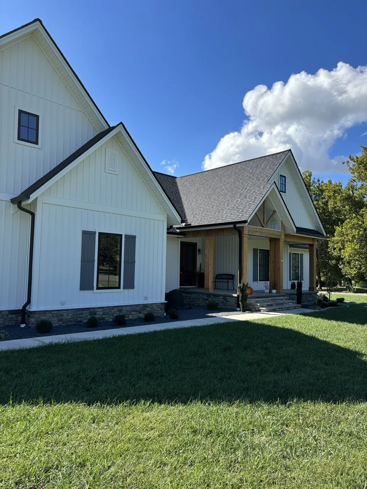 Servall seamless gutter installation on new farmhouse