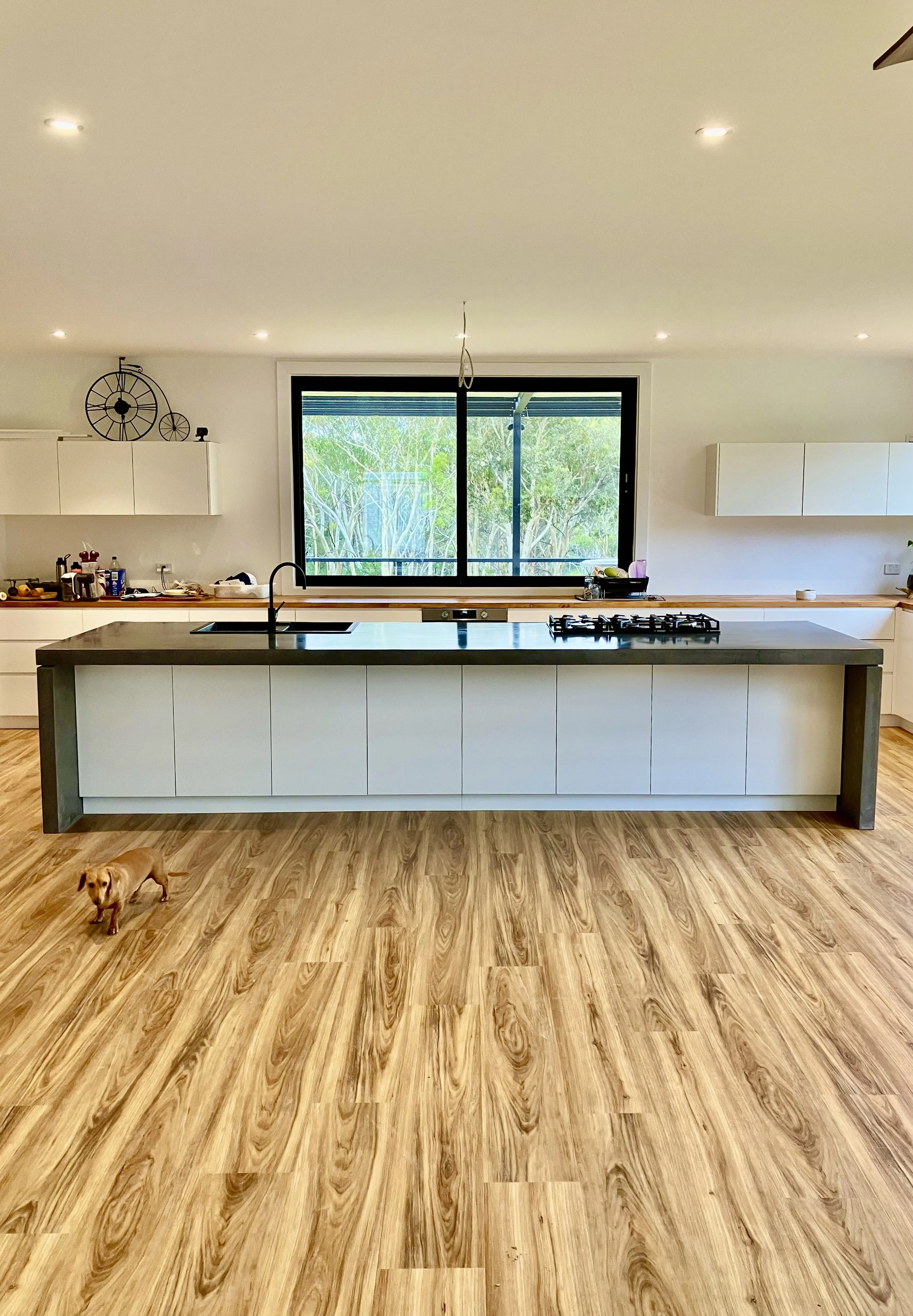 Minimalist concrete island bench with clean lines in a modern Melbourne kitchen