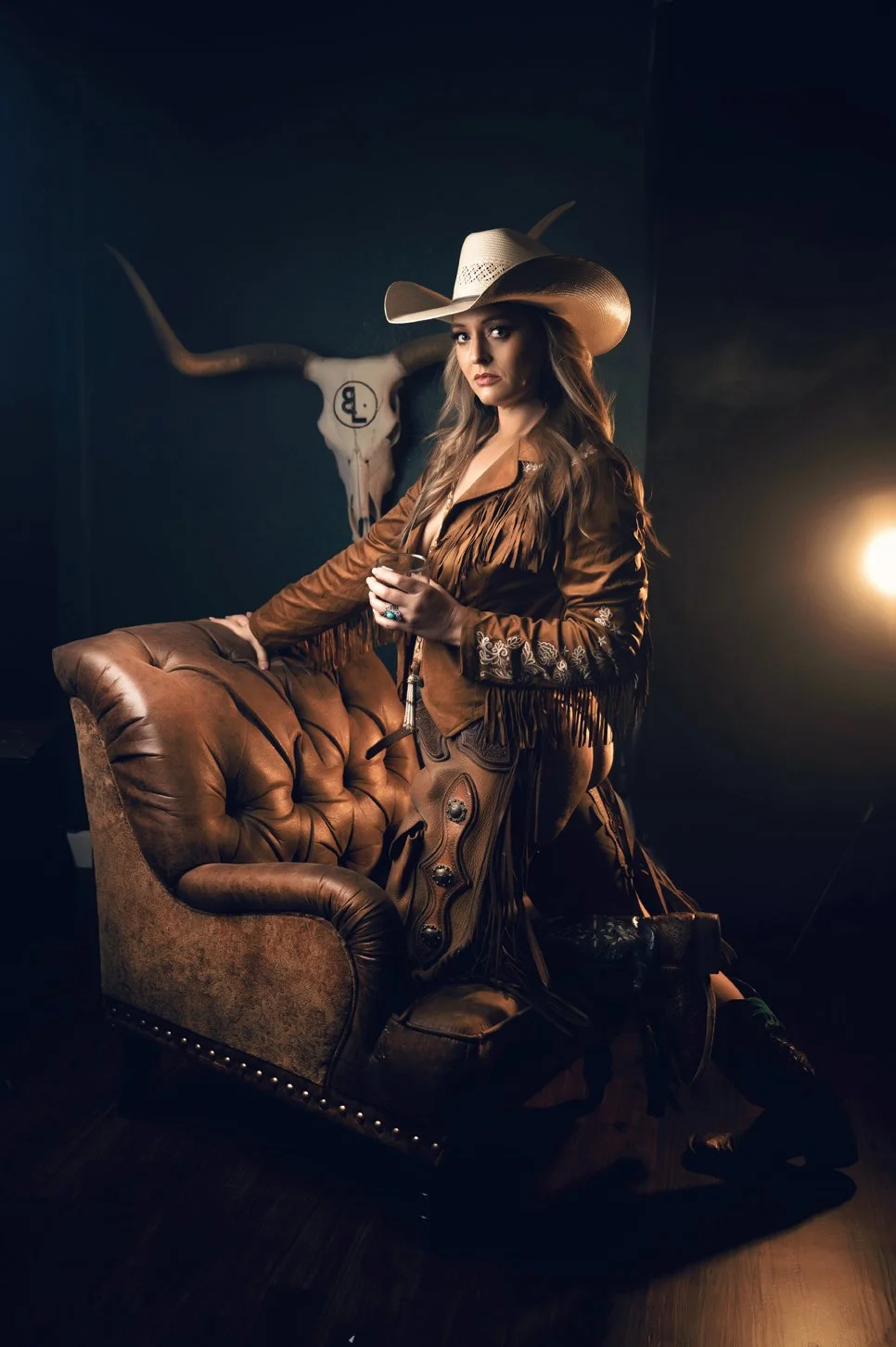 Western styling on the leather chair at the Boudoir by Kassie studio
