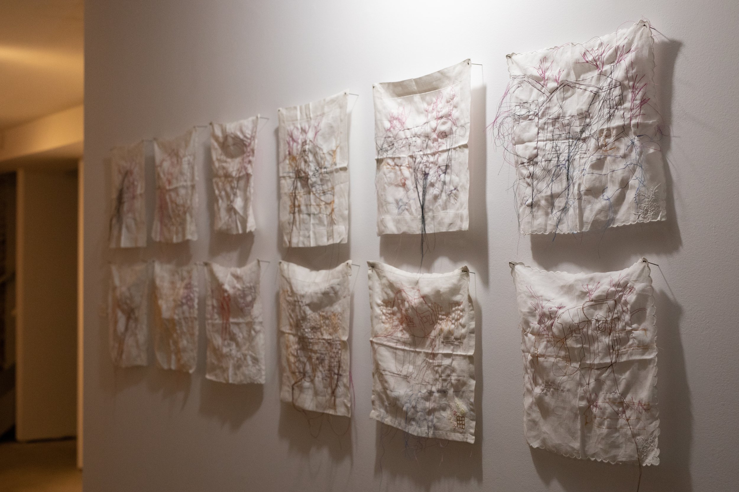 TO THINK I REAP WHAT I SEW. Found fabric, thread.