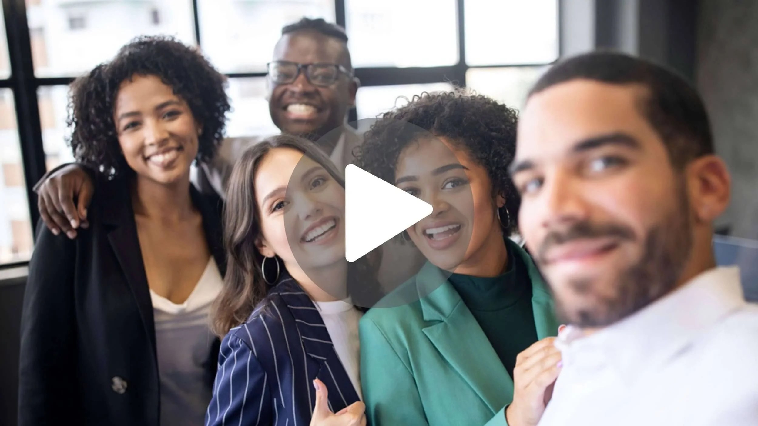 A group of colleagues smiling