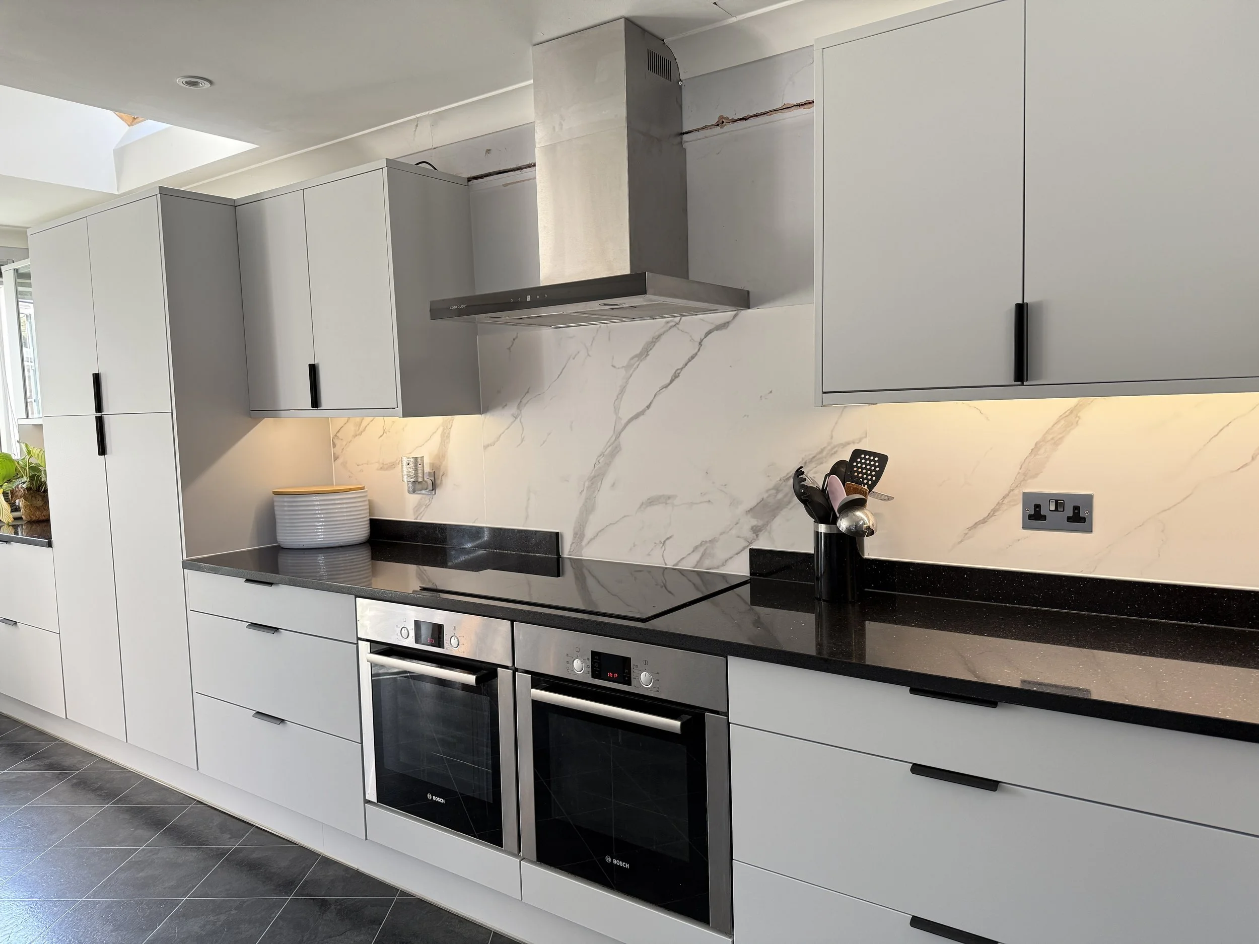 Light Grey Kitchen Wrap Transformation in Basingstoke: From UV-Damaged White to Contemporary Elegance