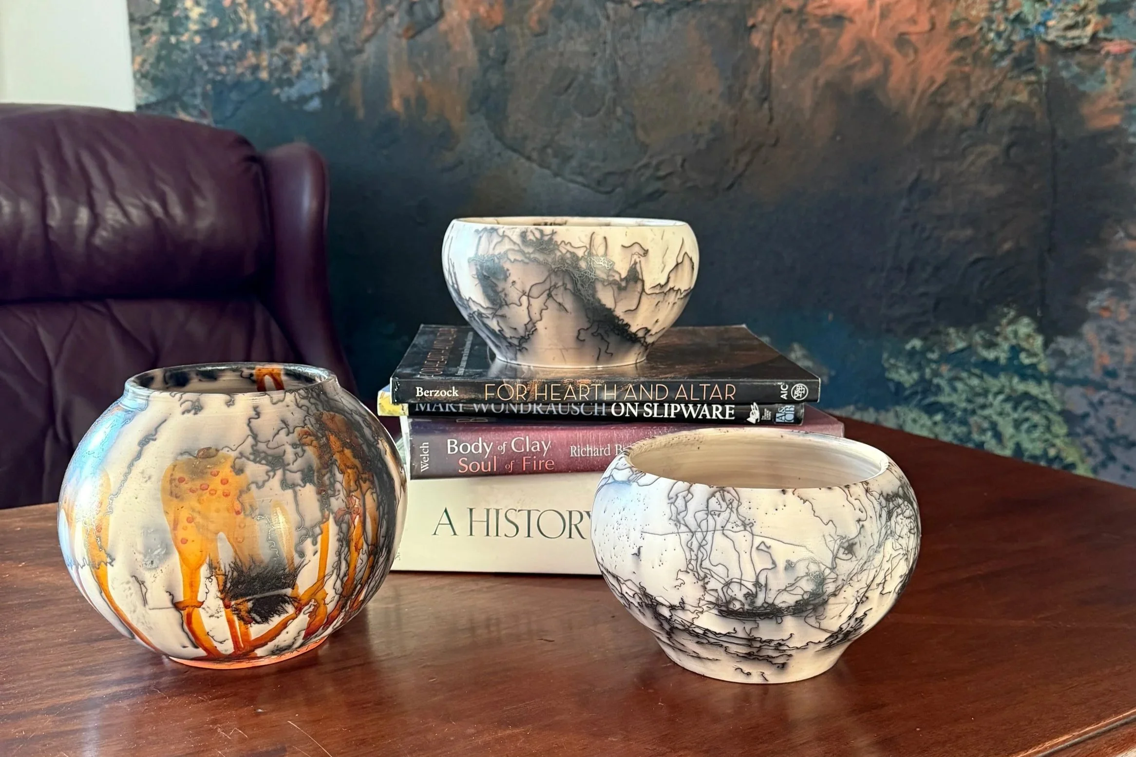 Three Horsehair vases of different shapes and sizes.