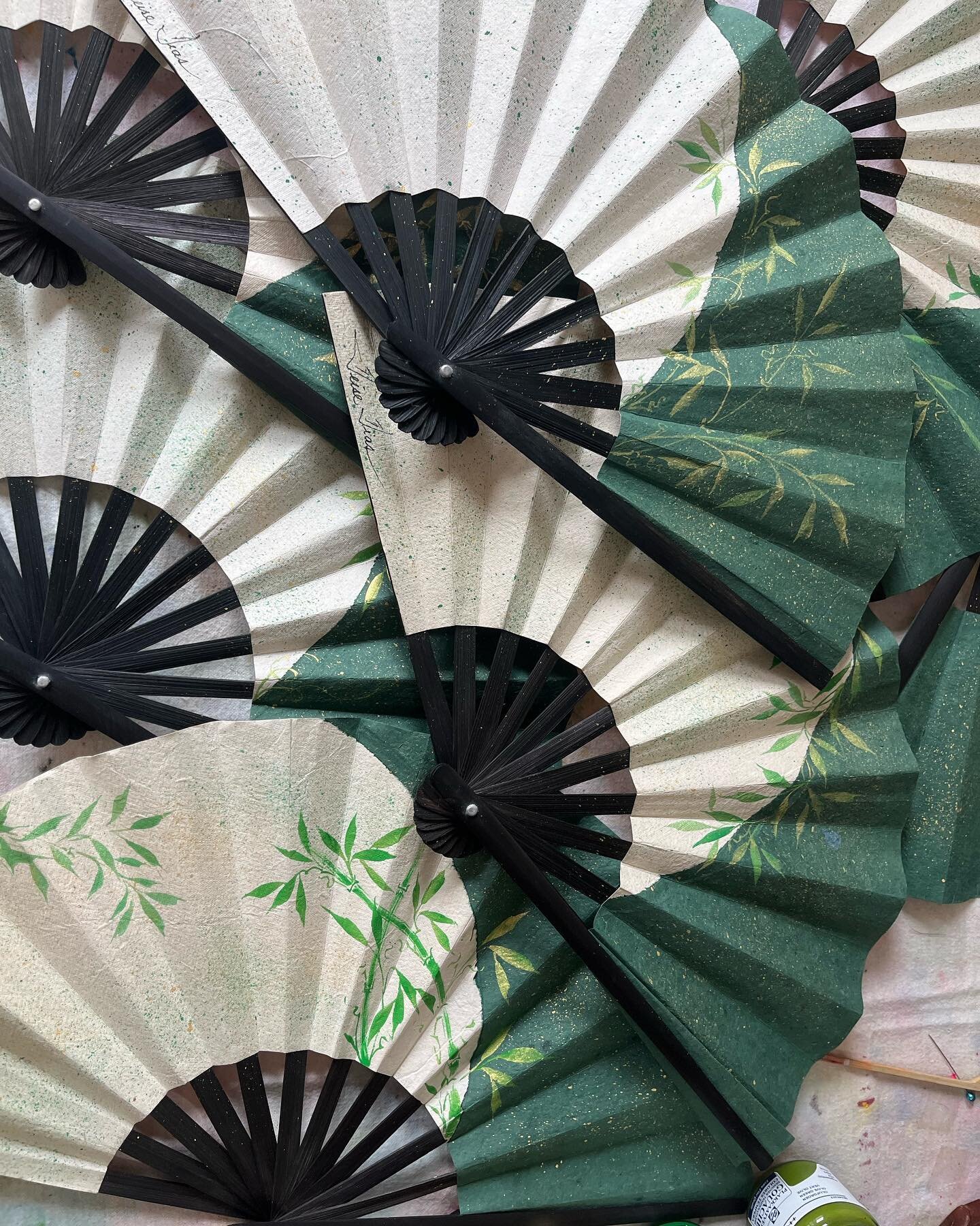Recycled paper and bamboo fans. 
Did you know ? 
Round fans and palm leaf fans were well known in China since ancient times . The folding variety is a Japanese invention introduced into China in the 11th century through Korea. Chinese believe that th