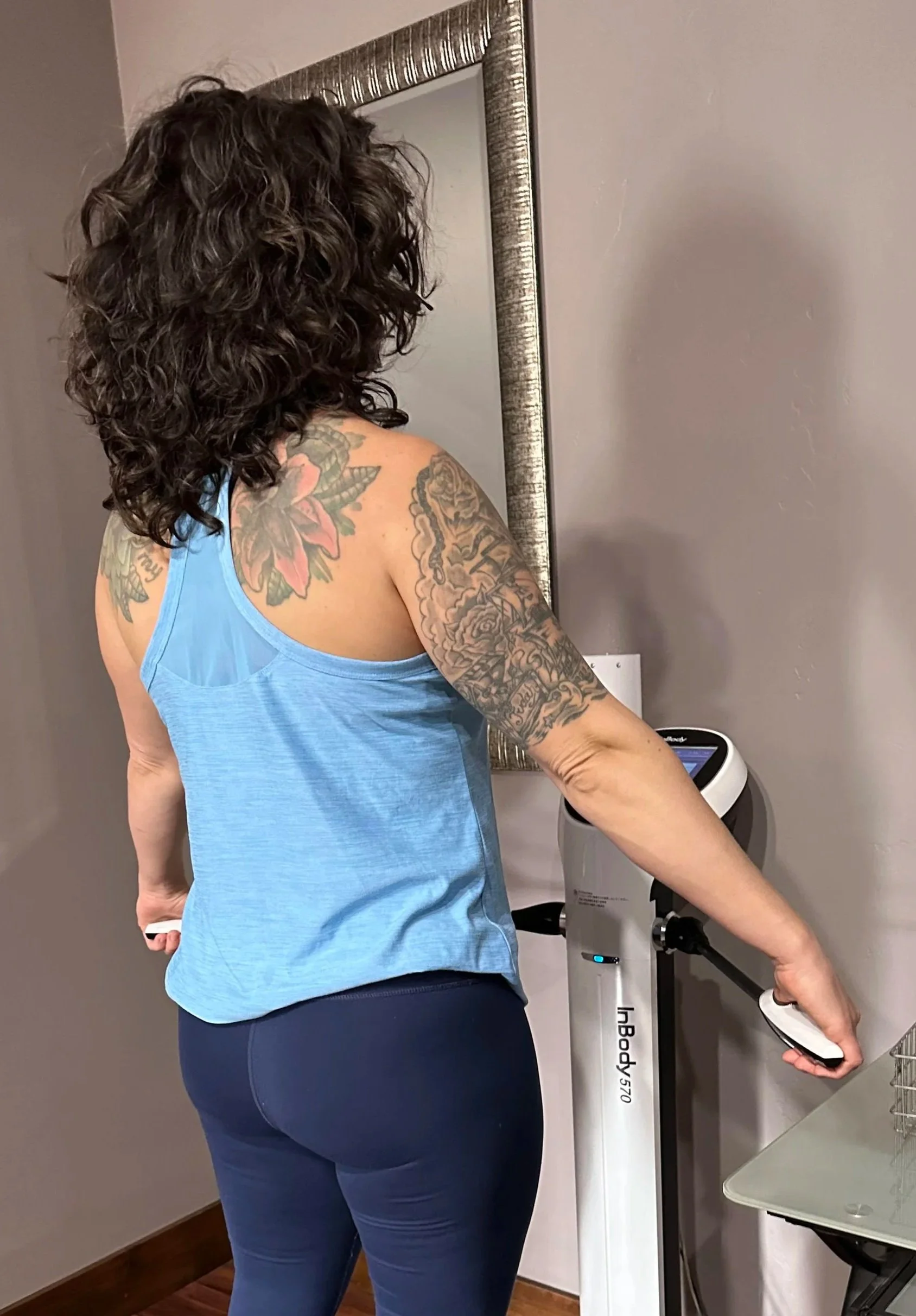 OPEX CDA member completing an InBody body-composition assessment.