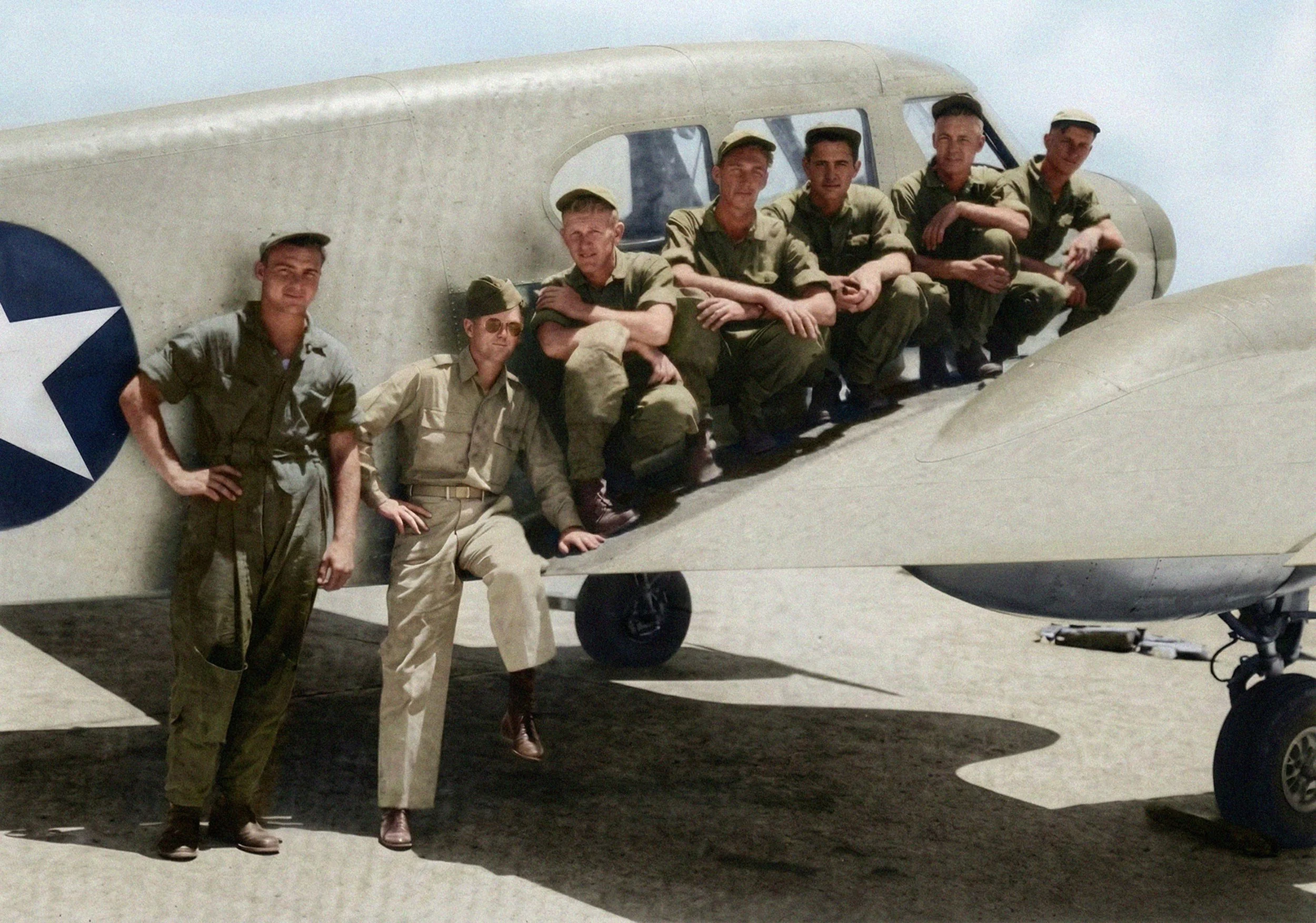 In a great find by our researchers, we see Air Cadet Bruce Nostrand, third from left, posing on the wing of a training aircraft at flight school in Yuma, Arizona. Class 43-G, Squadron 14.