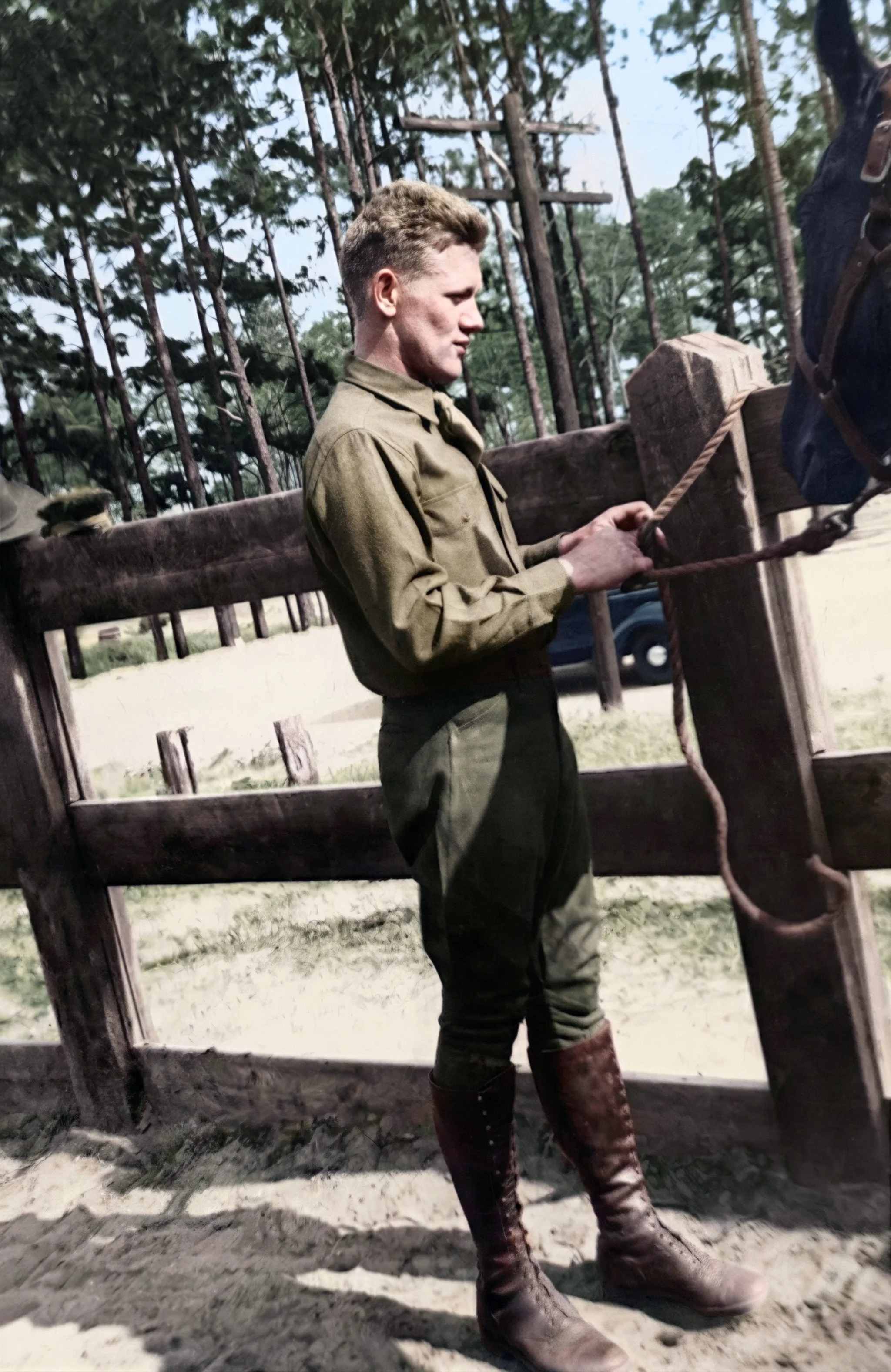 Still practicing mounted battle tactics in the 102nd Cavalry, Bruce Nostrand approaches his equine partner, preparing to start a training exercise. 