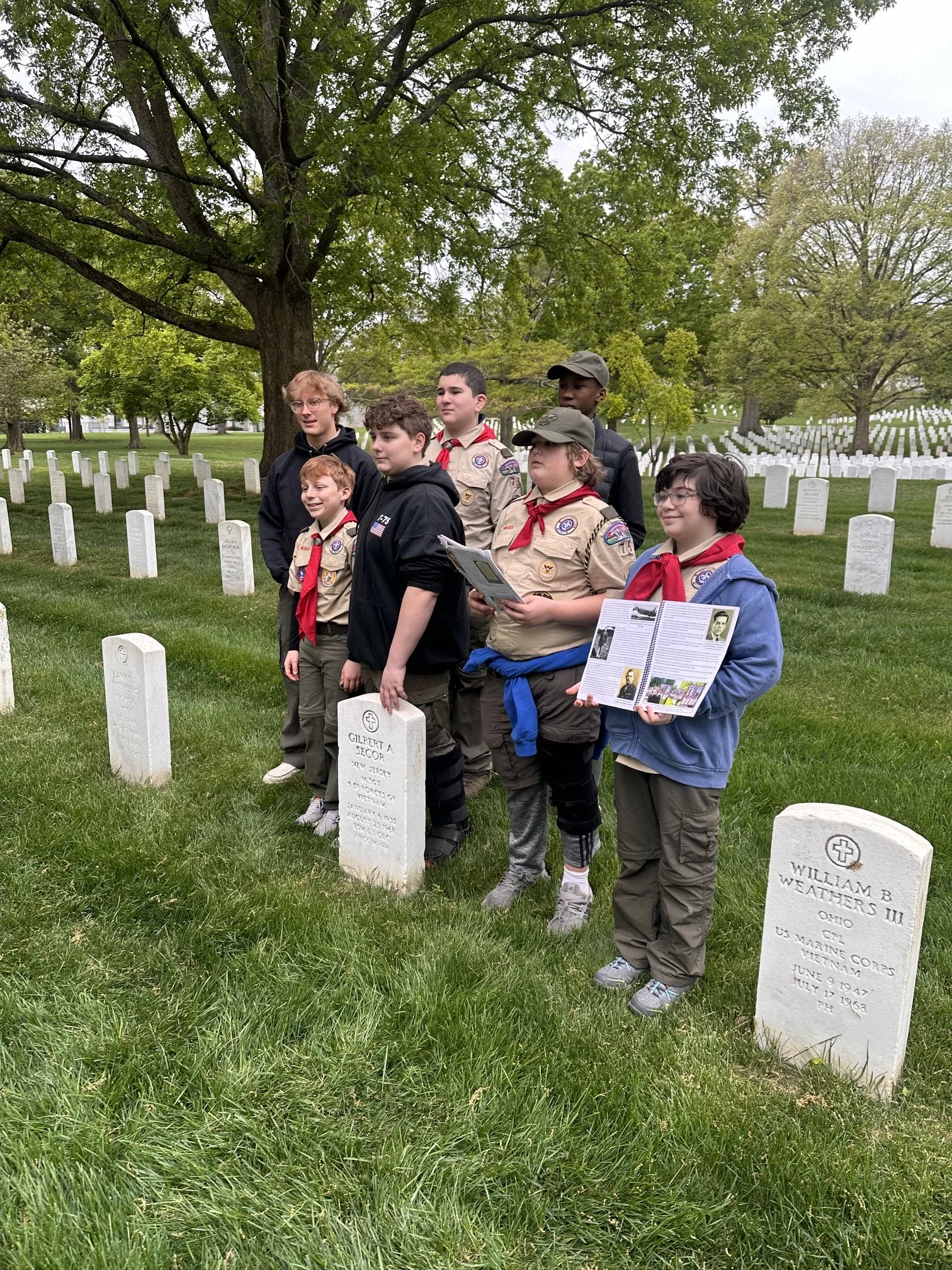 Boy Scouts Troop 75 from Cranford visit the grave of Gilbert in Arlington National Cemetery